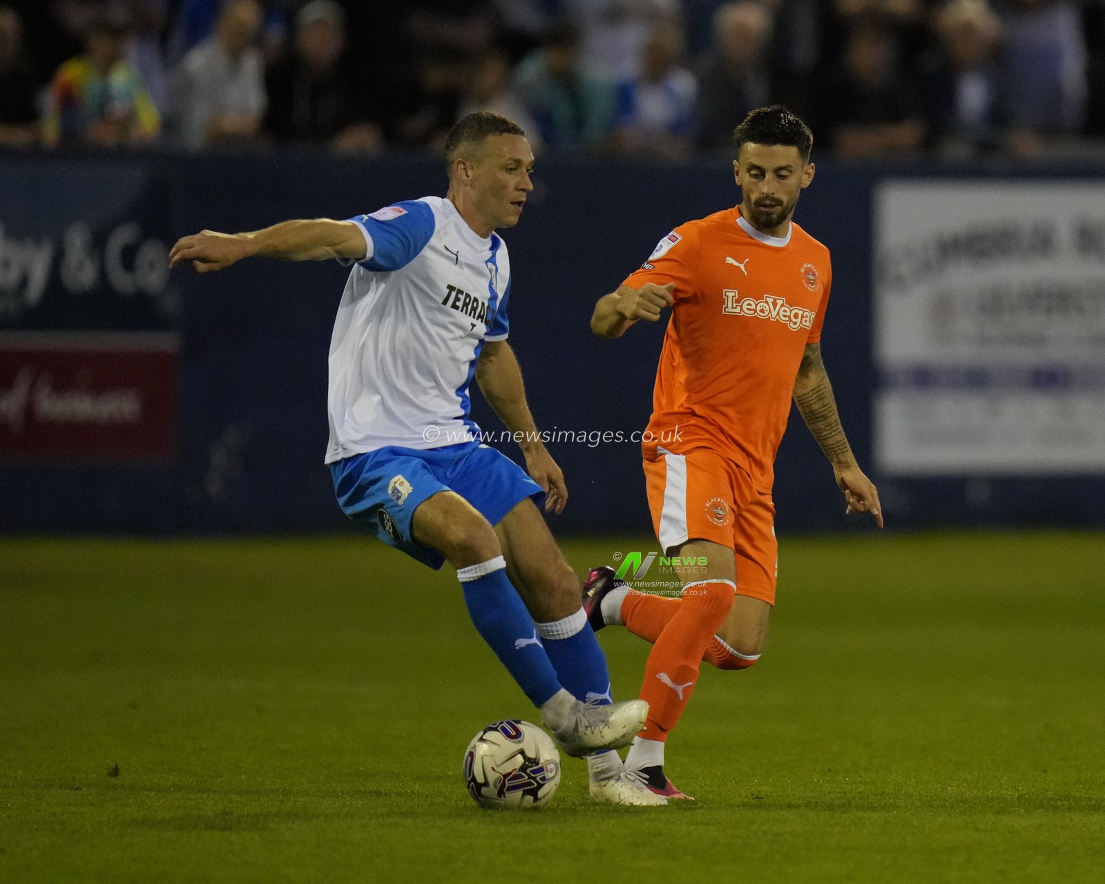 James Chester #17 of Barrow under pressure from Owen Dale #7 of Blackpool during the EFL Trophy match Barrow vs Blackpool at SO Legal Stadium, Barrow-in-Furness, United Kingdom, 5th September 2023

(Photo by Steve Flynn/News Images)