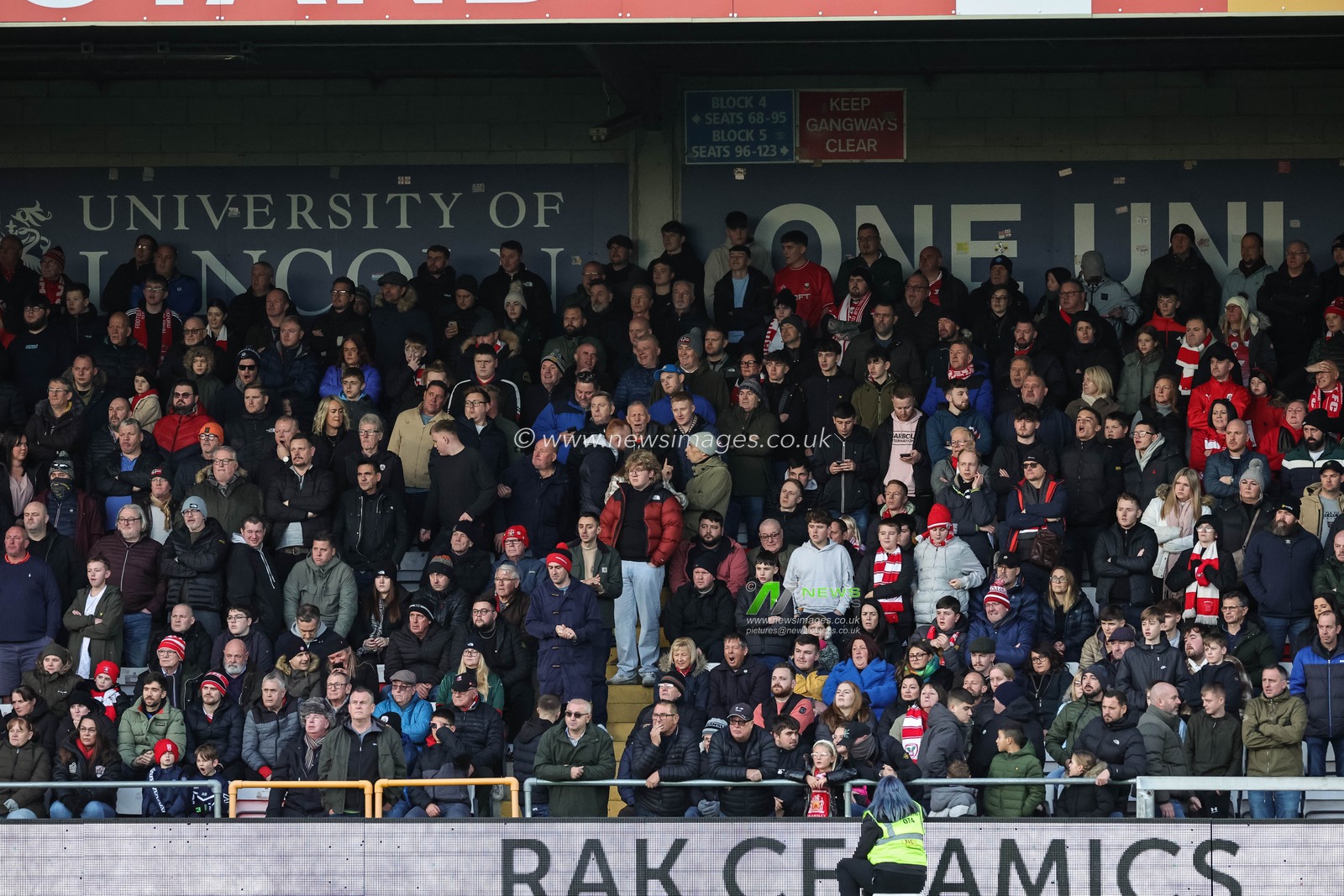 Traveling Barnsley fans during the Sky Bet League 1 match Lincoln City vs Barnsley at Gelder Group Sincil Bank Stadium, Lincoln, United Kingdom, 25th November 2023

(Photo by Mark Cosgrove/News Images)