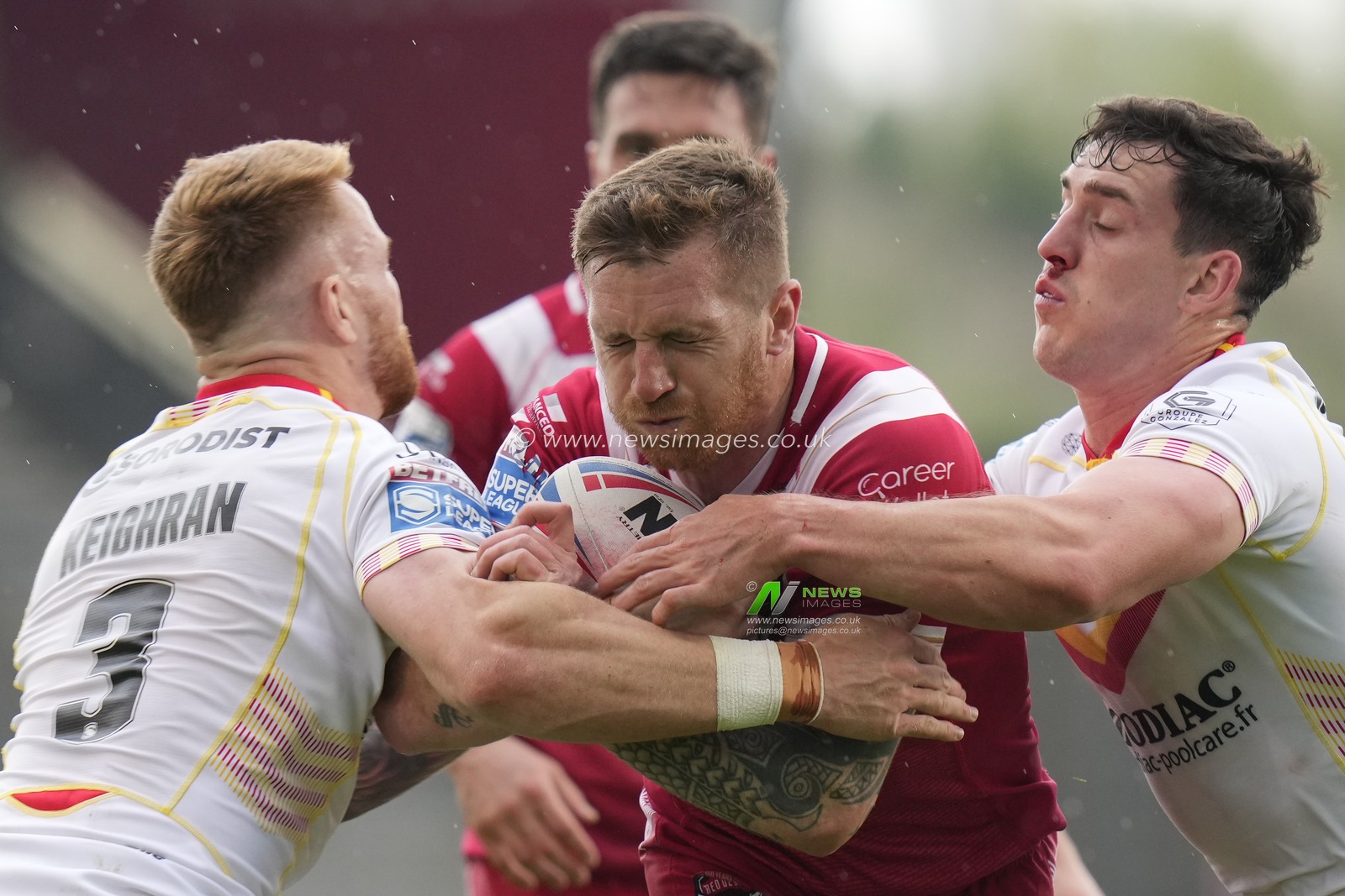 Adam Keighran #3 of Catalans Dragons tackles Marc Sneyd #7 of Salford Red Devils during the Betfred Super League Round 10 match Salford Red Devils vs Catalans Dragons at AJ Bell Stadium, Eccles, United Kingdom, 23rd April 2023

(Photo by Steve Flynn/News Images)