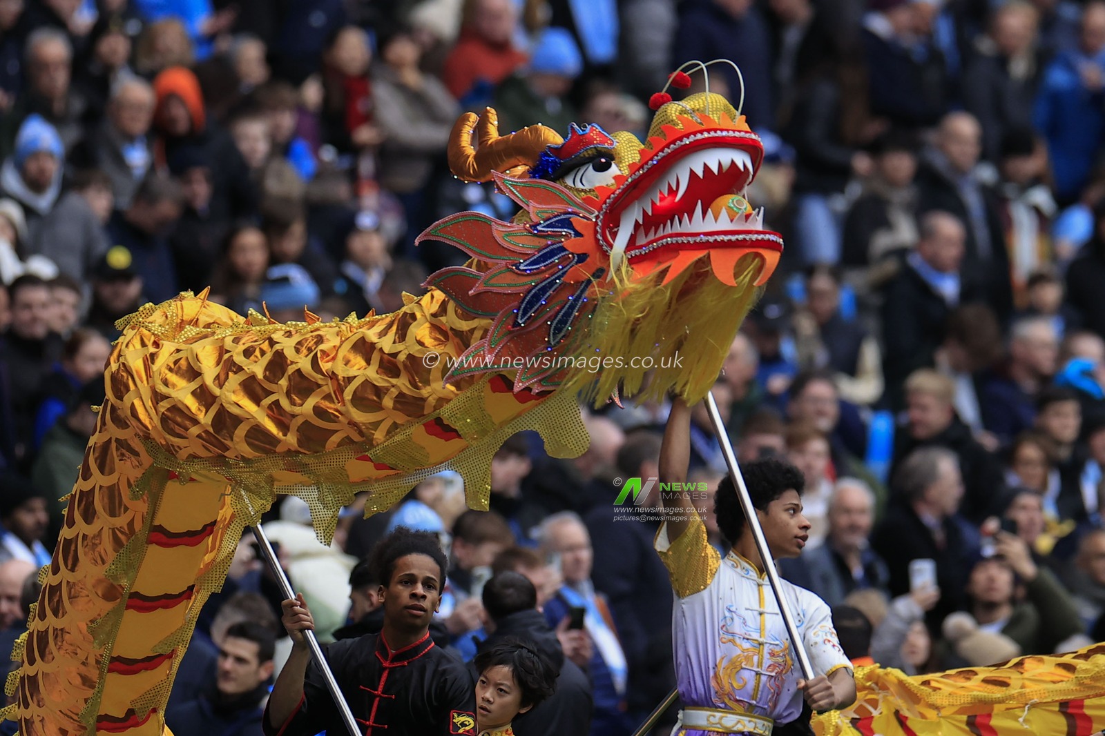 Fans are treated to a display celebrating the Chinese Year of the dragon at half time during the Premier League match Manchester City vs Everton at Etihad Stadium, Manchester, United Kingdom, 10th February 2024

(Photo by Conor Molloy/News Images)