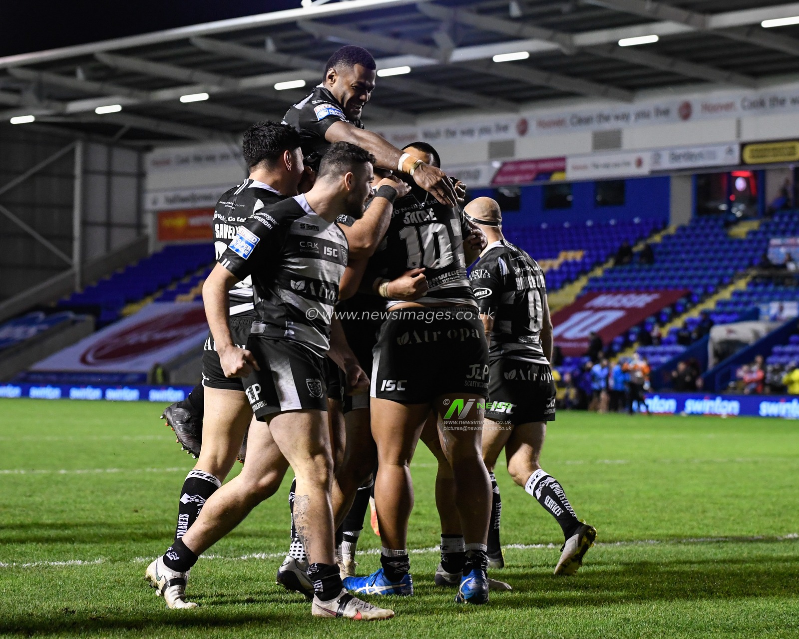 CELEBRATION Chris Satae #10 of Hull FC celebrates his try with his team mates to make it 8-17