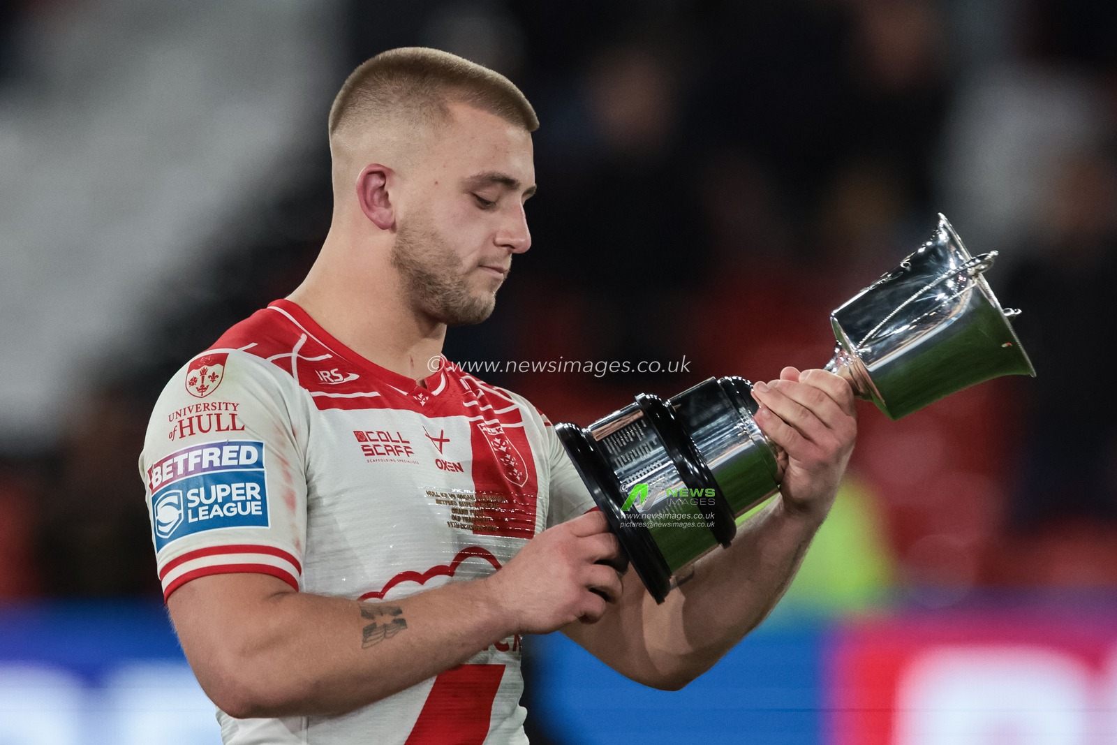 Mikey Lewis of Hull KR reads the names of previous winners of the man of the match trophy during the 2025 Betfred Super League Grand Final Hull KR v Wigan Warriors at Old Trafford, Manchester, United Kingdom, 11th October 2025

(Photo by Mark Cosgrove/News Images)