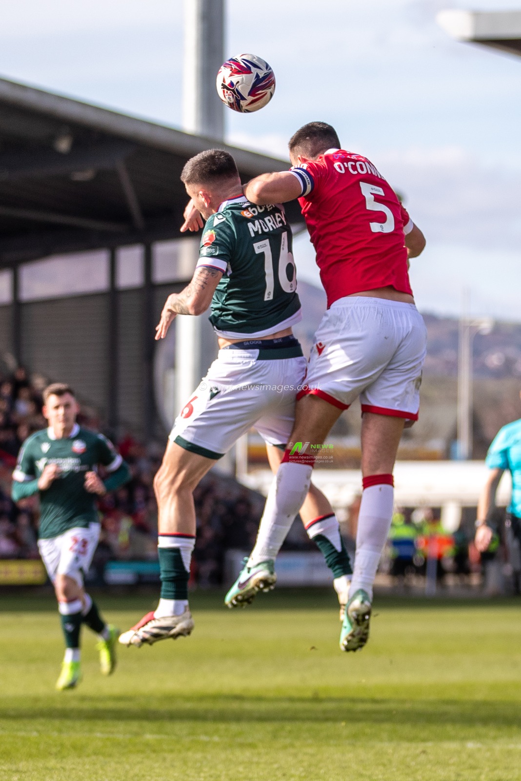 Aaron Morley of Bolton Wanderers and Eoghan O'Connell of Wrexham AFC during the Sky Bet League 1 match Wrexham vs Bolton Wanderers at SToK Cae Ras, Wrexham, United Kingdom, 1st March 2025

(Photo by Nik Mesney/News Images)