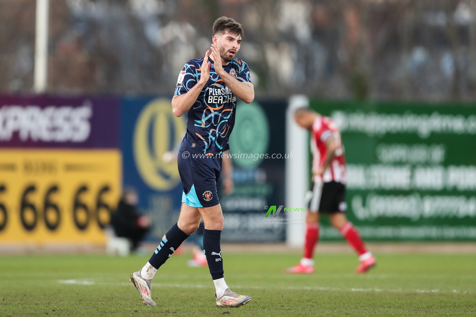 Tom Bloxham of Blackpool applauds the travelling fans as he leaves the pitch during the Sky Bet League 1 match Exeter City vs Blackpool at St James' Park, Exeter, United Kingdom, 25th January 2025

(Photo by Gareth Evans/News Images)
