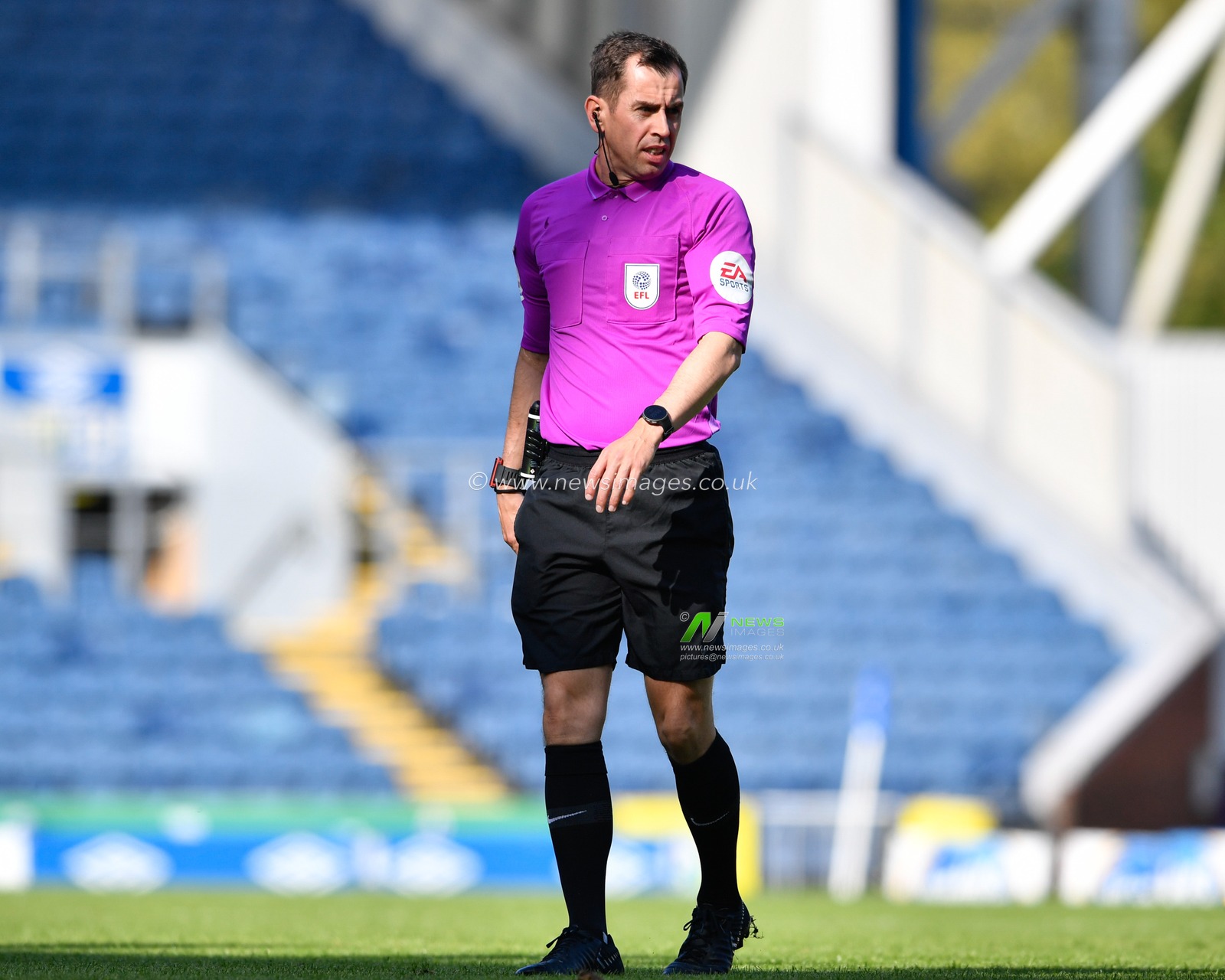 Referee Peter Bankes in action