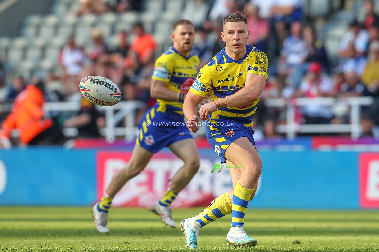 George Williams #6 of Warrington Wolves passes the ball during the Magic Weekend match Hull FC vs Warrington Wolves at St. James's Park, Newcastle, United Kingdom, 4th June 2023

(Photo by Gareth Evans/News Images)