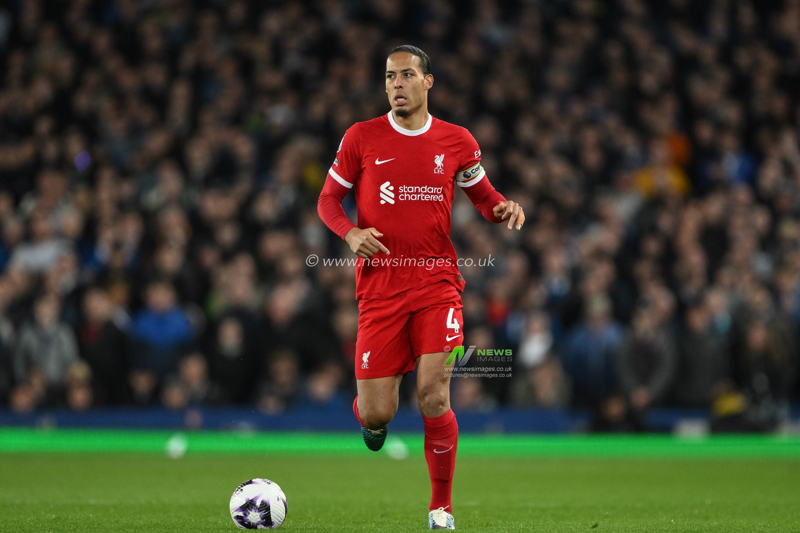 Virgil van Dijk of Liverpool with the ball during the Premier League match Everton vs Liverpool at Goodison Park, Liverpool, United Kingdom, 24th April 2024

(Photo by Craig Thomas/News Images)