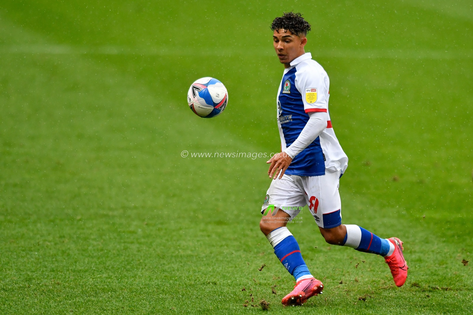 Tyrhys Dolan (39) of Blackburn Rovers looks to control the ball