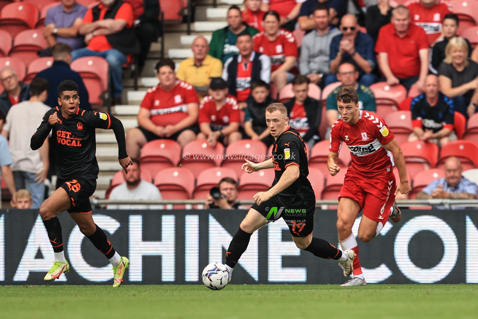 Shayne Lavery #19 of Blackpool breaks with the ball