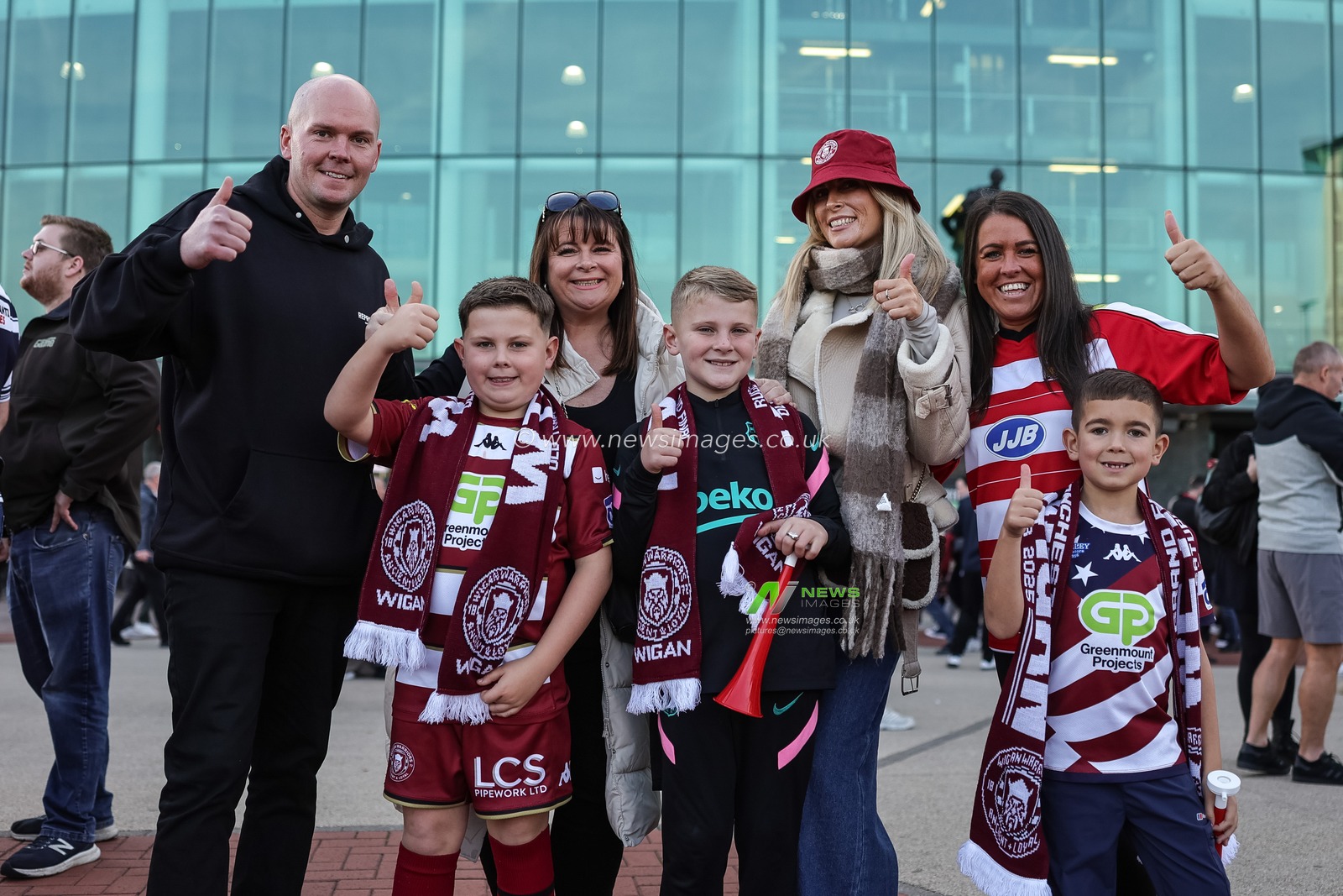 Wigan fans arrive during the 2025 Betfred Super League Grand Final Hull KR v Wigan Warriors at Old Trafford, Manchester, United Kingdom, 11th October 2025

(Photo by Mark Cosgrove/News Images)