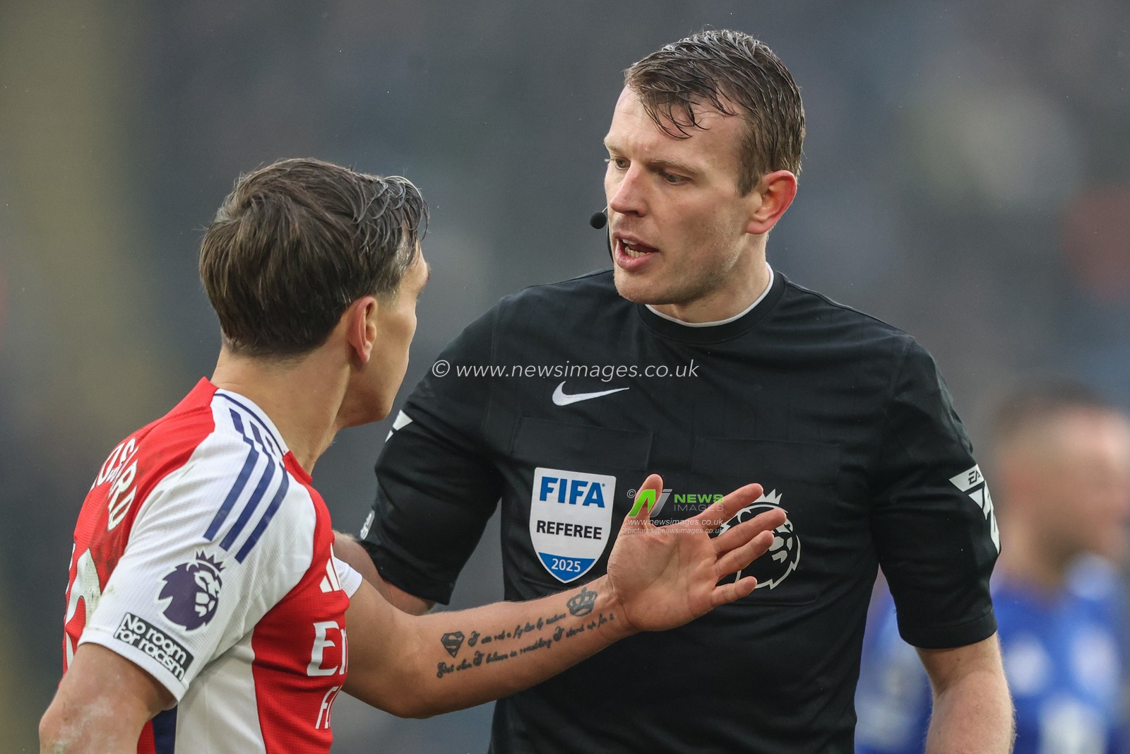Leandro Trossard of Arsenal speaks to referee Samuel Barrott during the Premier League match Leicester City vs Arsenal at King Power Stadium, Leicester, United Kingdom, 15th February 2025

(Photo by Alfie Cosgrove/News Images)