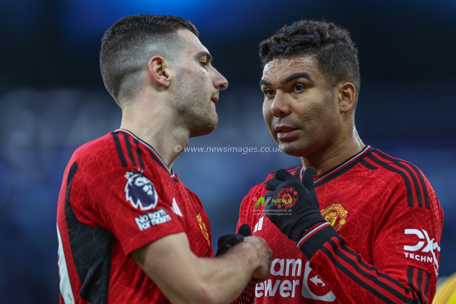 Diogo Dalot of Manchester United embraces Casemiro of Manchester United during the Premier League match Manchester City vs Manchester United at Etihad Stadium, Manchester, United Kingdom, 3rd March 2024

(Photo by Mark Cosgrove/News Images)