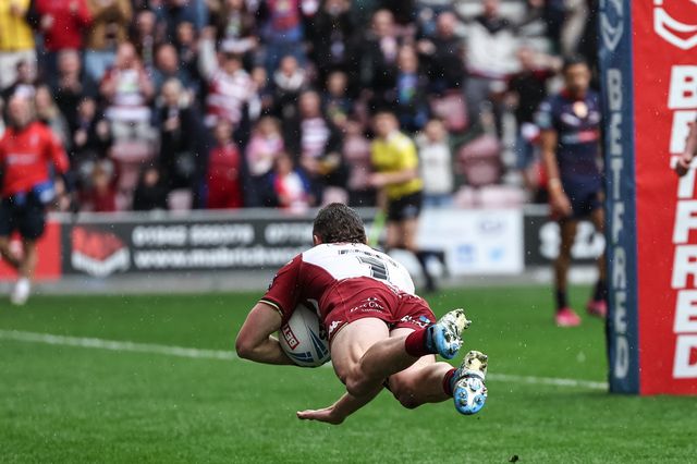 Jai Field of Wigan Warriors goes over for a try during the Betfred Super League Round 8 match Wigan Warriors vs St Helens at The Brick Community Stadium, Wigan, United Kingdom, 18th April 2025

(Photo by Mark Cosgrove/News Images)