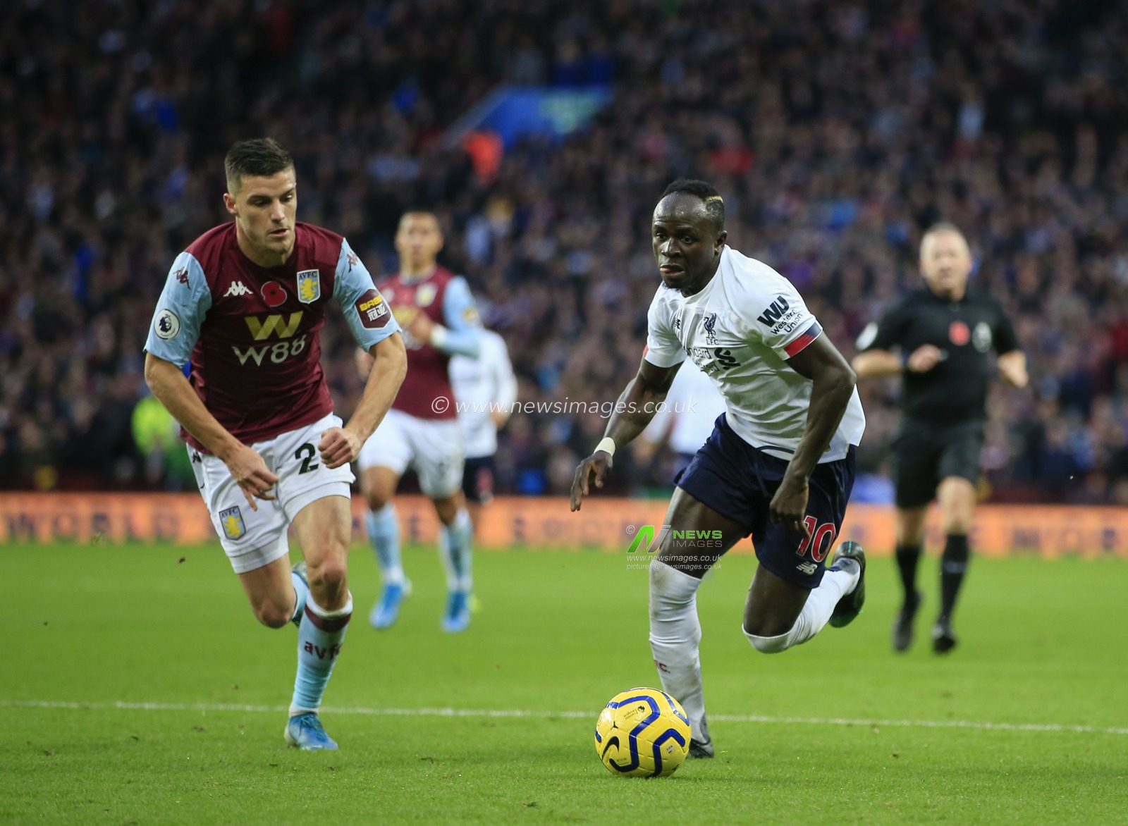 2nd November 2019, Villa Park, Birmingham, England; Premier League, Aston Villa v Liverpool : Sadio Mane (10) of Liverpool is chased by Frederic Guilbert (24) of Aston Villa


Credit: Conor Molloy/News Images