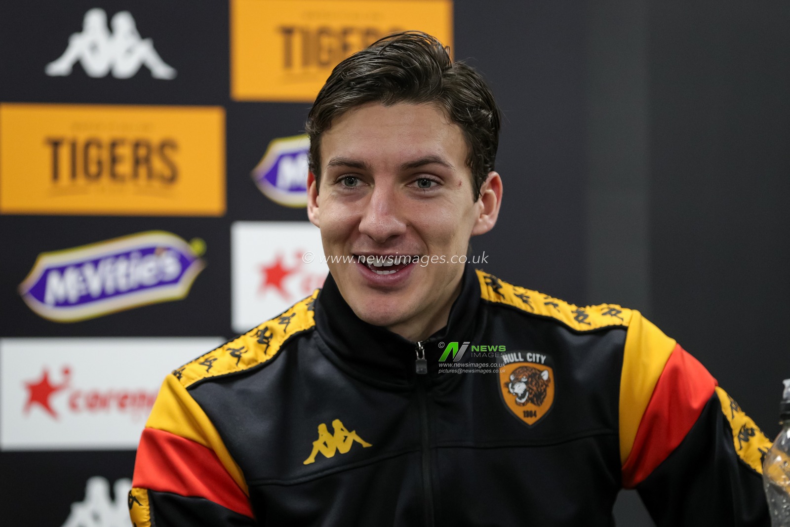 Alfie Jones #5 of Hull City smiles in the press conference after the Sky Bet Championship match Hull City vs Blackburn Rovers at MKM Stadium, Hull, United Kingdom, 29th December 2023

(Photo by James Heaton/News Images)