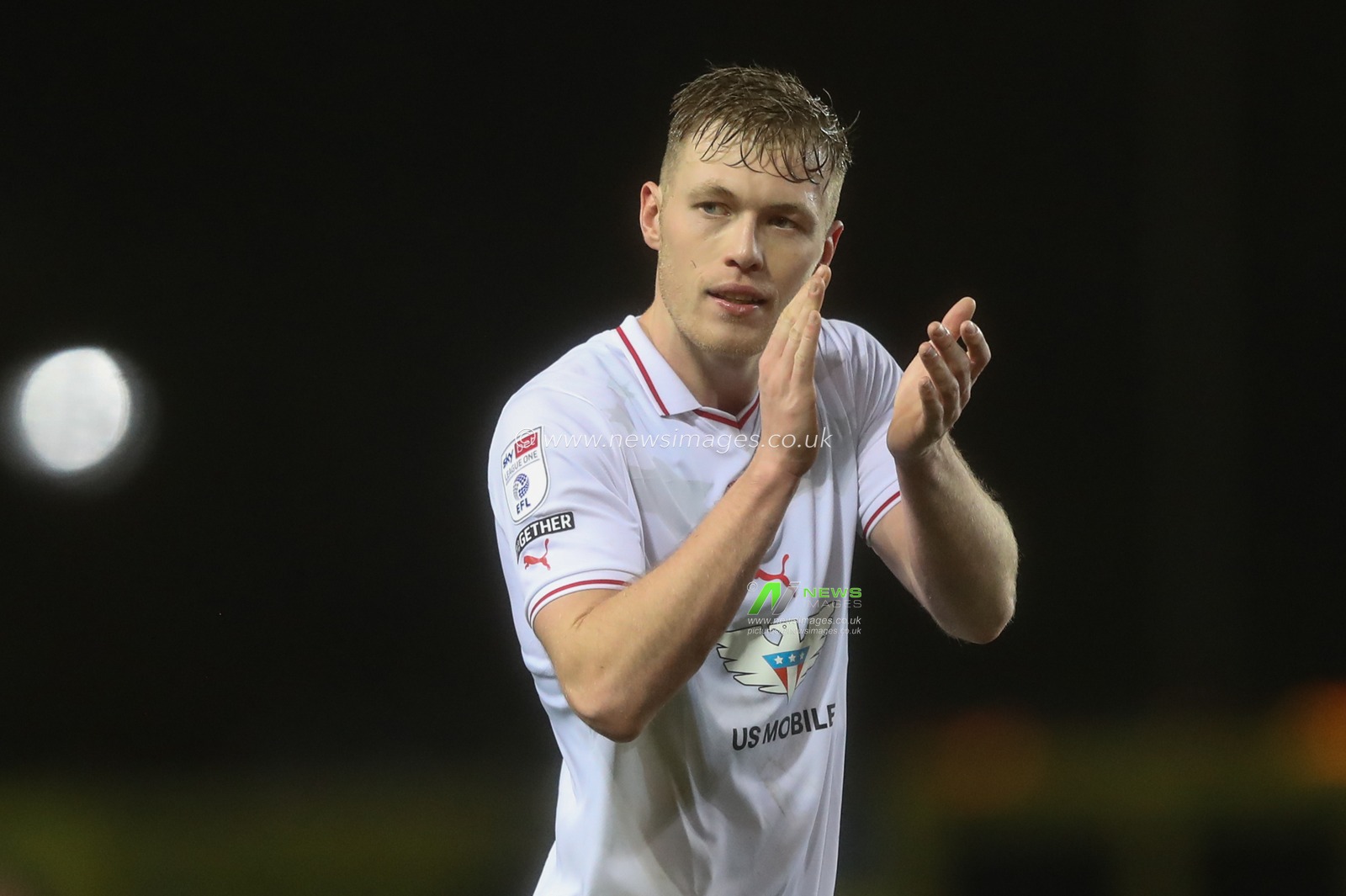 Sam Cosgrove of Barnsley applauds the travelling fans during the Sky Bet League 1 match Oxford United vs Barnsley at Kassam Stadium, Oxford, United Kingdom, 23rd January 2024

(Photo by Alfie Cosgrove/News Images)