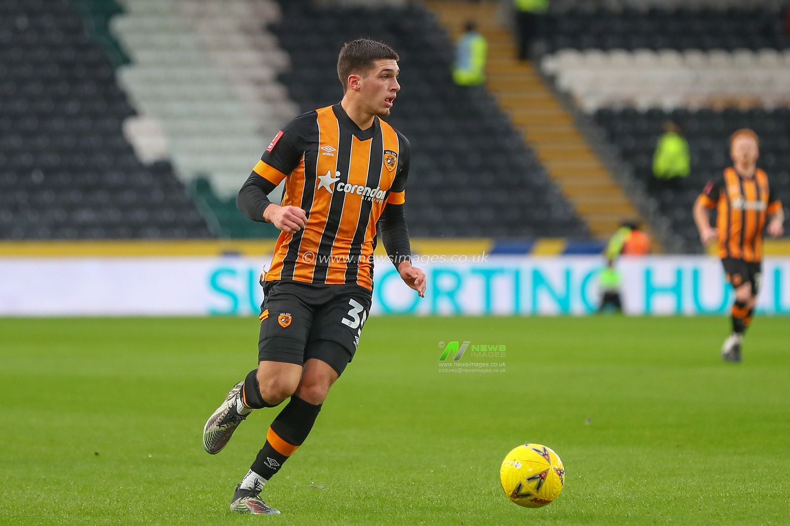 Xavier Simons #35 of Hull City runs with the ball during the Emirates FA Cup Third Round match Hull City vs Fulham at MKM Stadium, Hull, United Kingdom, 7th January 2023

(Photo by Gareth Evans/News Images)