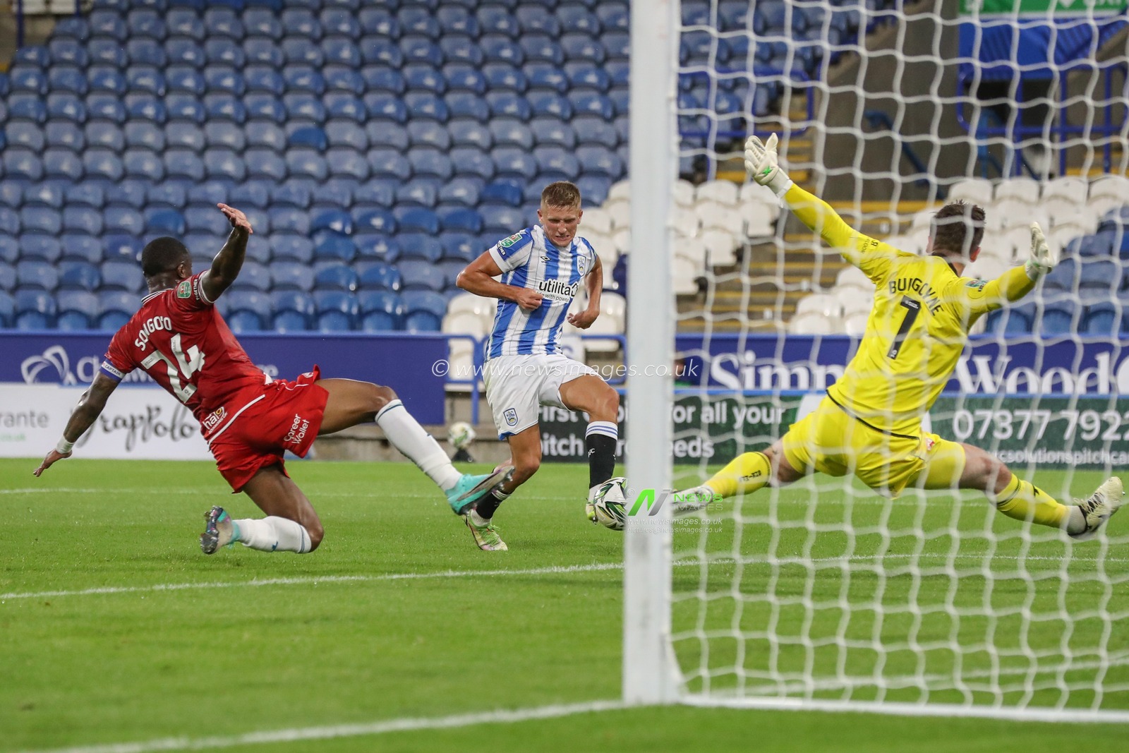 Callum Marshall of Huddersfield Town scores to make it 2-0 during the Carabao Cup match Huddersfield Town vs Morecambe at John Smith's Stadium, Huddersfield, United Kingdom, 13th August 2024

(Photo by Alfie Cosgrove/News Images)