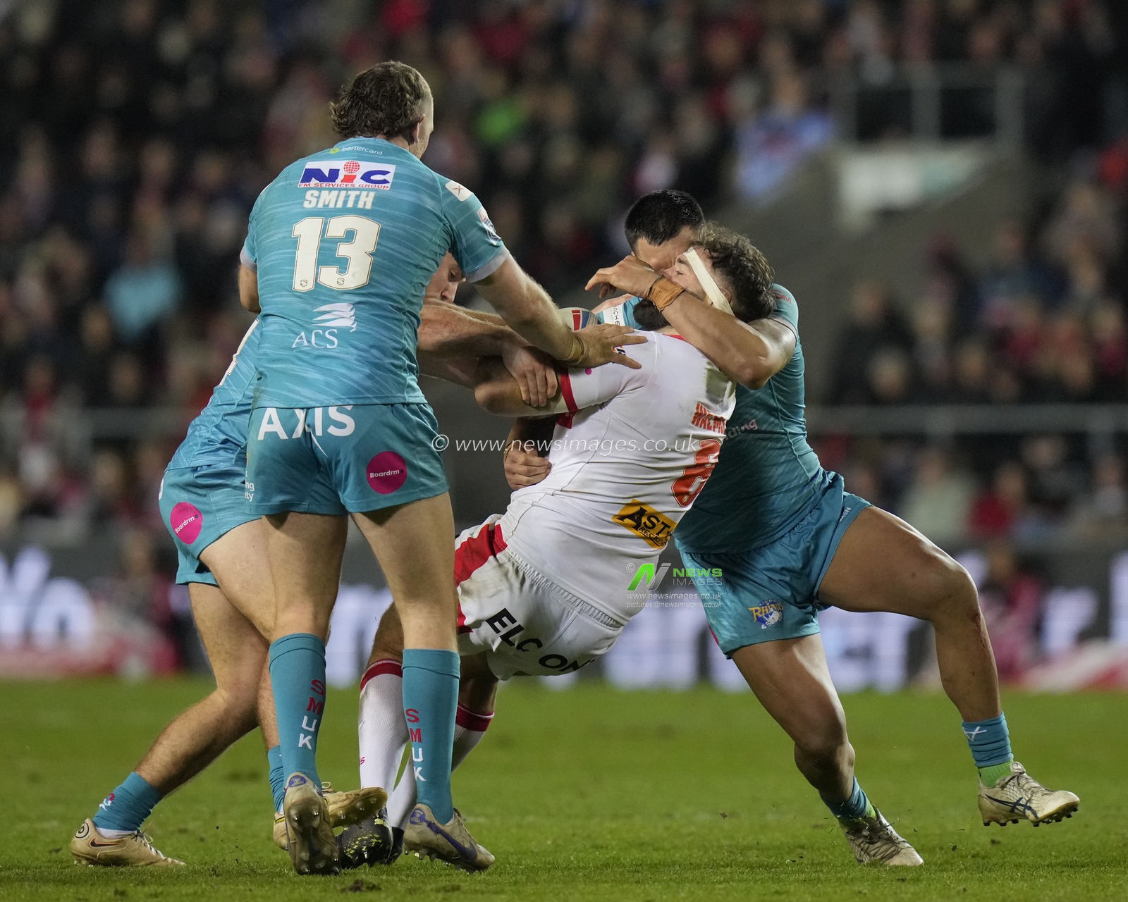 Zane Tetevano #10 of Leeds Rhinos tackles Alex Walmsley #8 of St. Helens during the Betfred Super League Round 3 match St Helens vs Leeds Rhinos at Totally Wicked Stadium, St Helens, United Kingdom, 3rd March 2023

(Photo by Steve Flynn/News Images)