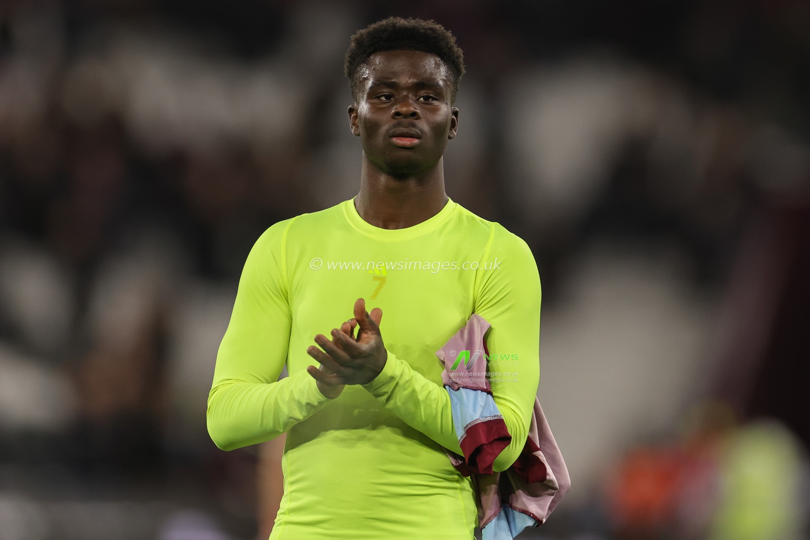 Bukayo Saka #7 of Arsenal applauds the travelling fans after the Carabao Cup Fourth Round match West Ham United vs Arsenal at London Stadium, London, United Kingdom, 1st November 2023

(Photo by Mark Cosgrove/News Images)