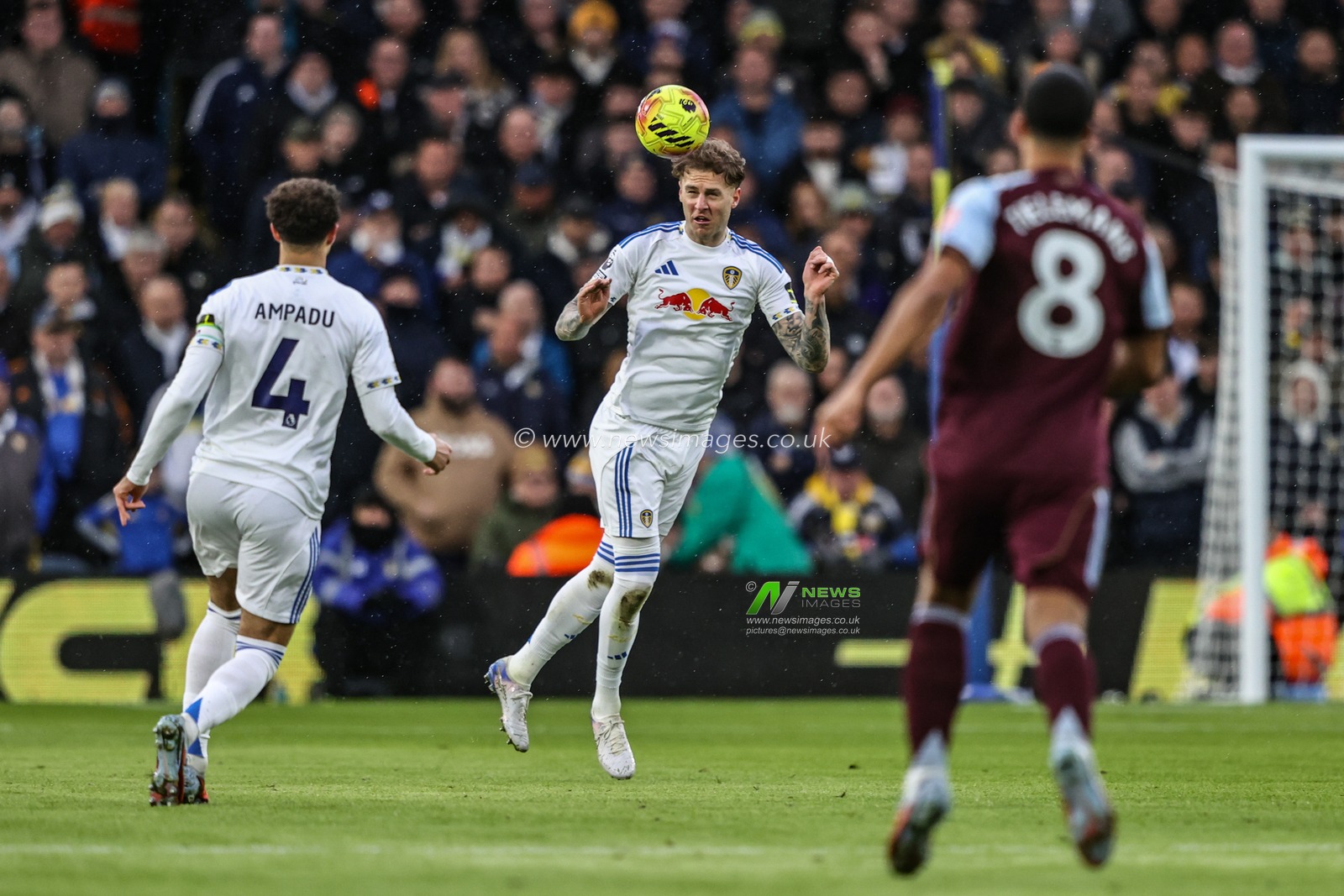 Joe Rodon of Leeds United jumps up to win the high ball during the Premier League match Leeds United vs Aston Villa at Elland Road, Leeds, United Kingdom, 23rd November 2025

(Photo by Alfie Cosgrove/News Images)

*** GER AUT SUI OUT ***