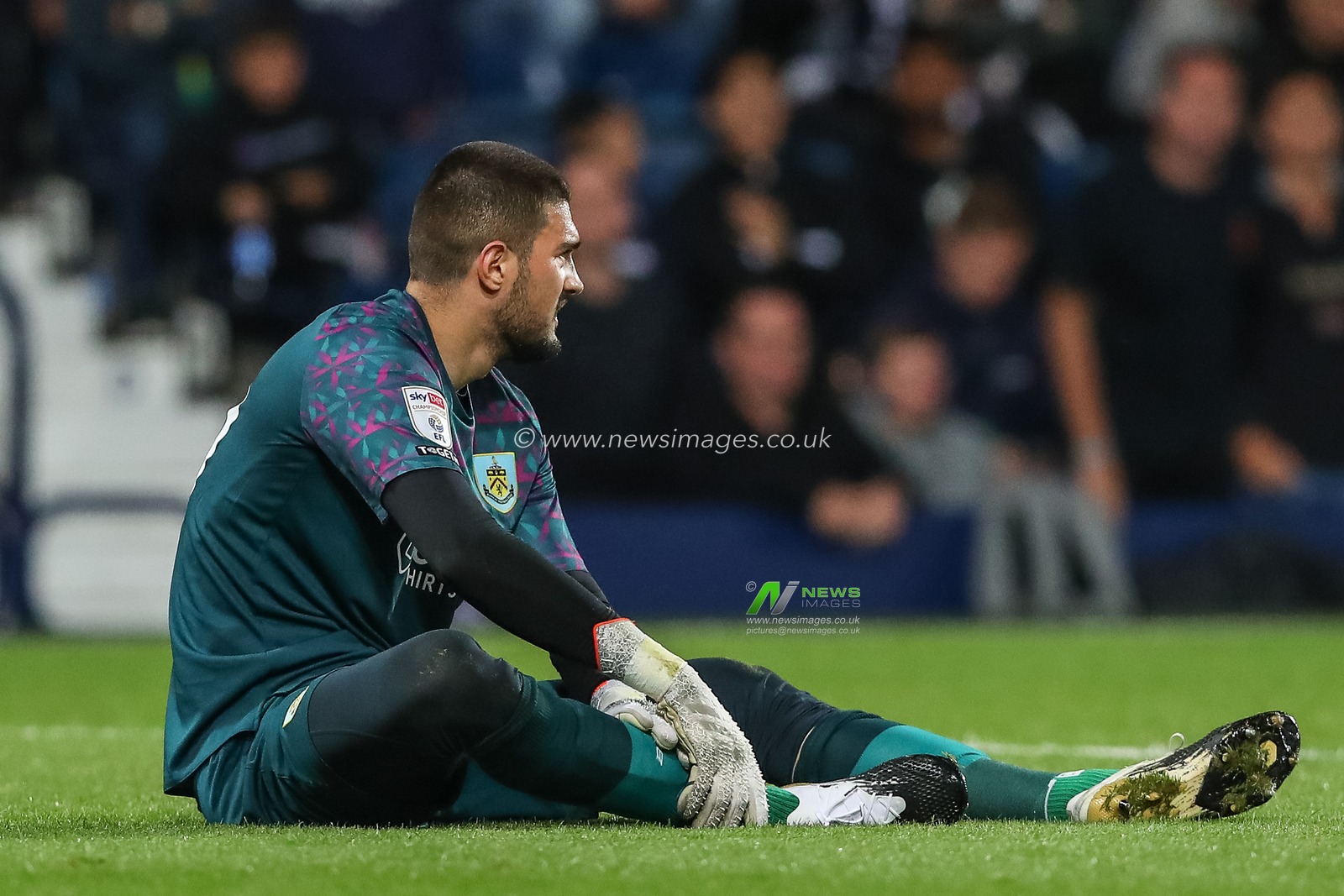 Arijanet MuriÄ‡ #49 of Burnley goes down injured during the Sky Bet Championship match West Bromwich Albion vs Burnley at The Hawthorns, West Bromwich, United Kingdom, 2nd September 2022

(Photo by Gareth Evans/News Images)