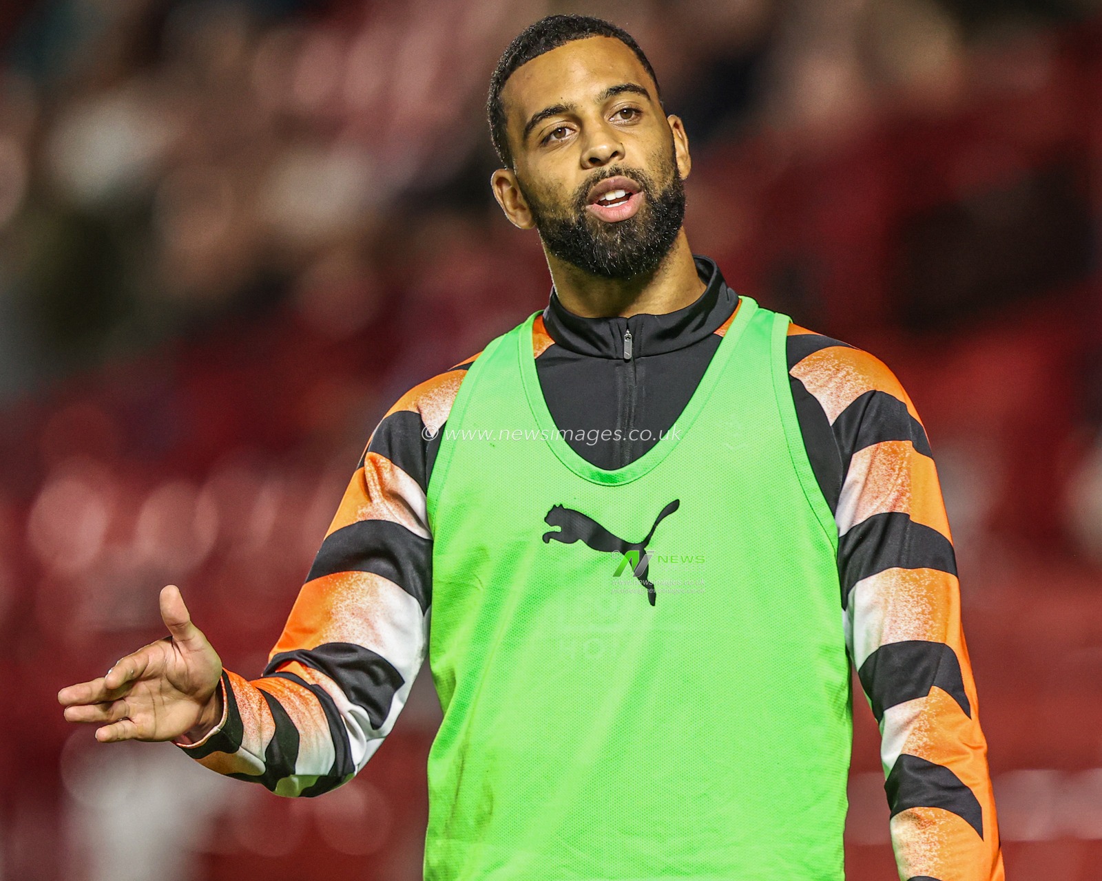 CJ Hamilton of Blackpool warms up on the sidelines during the Sky Bet League One match Barnsley vs Blackpool at Oakwell, Barnsley, United Kingdom on 02 September 2026

(Photo by Alfie Cosgrove/News Images)
