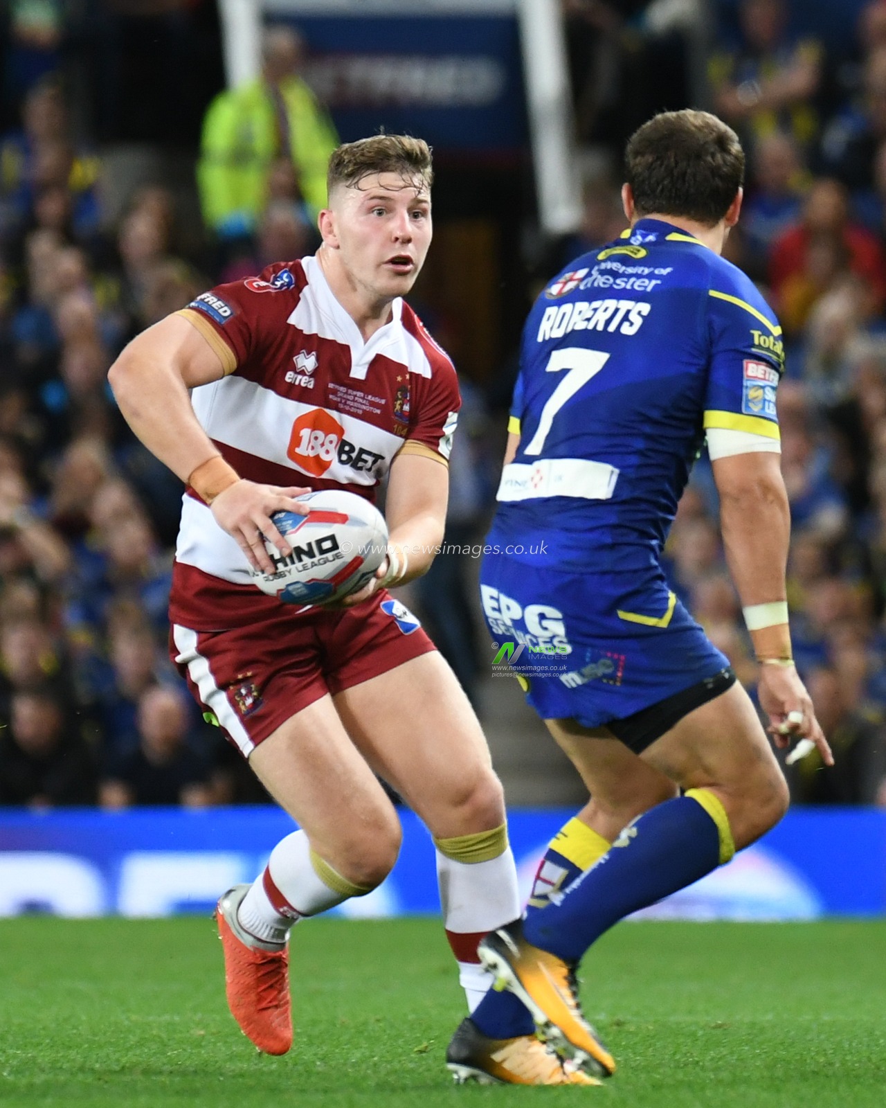 13th October 2018 , Old Trafford,  Manchester, England;  Betfred Super League Grand Final, Wigan Warriors v Warrington Wolves; George Williams of Wigan Warriors looks for a way past Tyrone Roberts of Warrington Wolves 


Credit: Richard Long/News Images