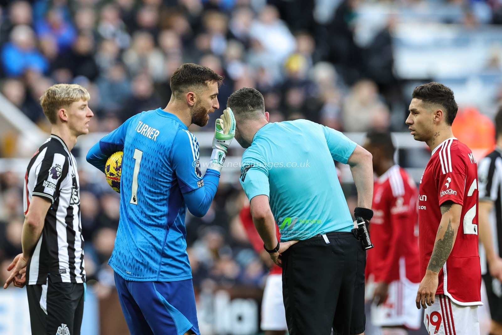 Matt Turner of Nottingham Forest speaks to referee Chris Kavanagh  after Newcastle are awarded a penalty during the Premier League match Newcastle United vs Nottingham Forest at St. James's Park, Newcastle, United Kingdom, 26th December 2023

(Photo by Mark Cosgrove/News Images)