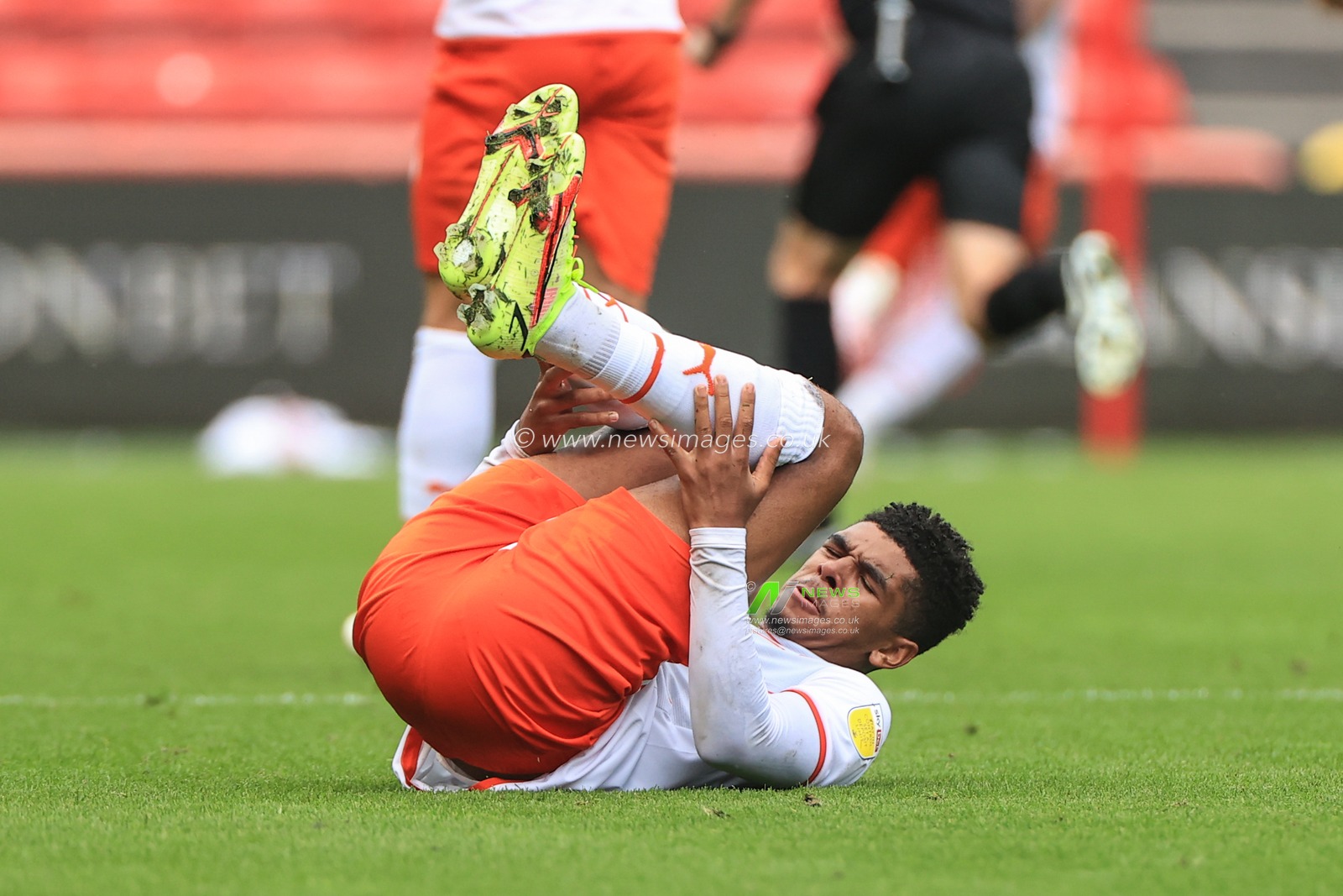 Tyreece John-Jules #28 of Blackpool takes a knock
