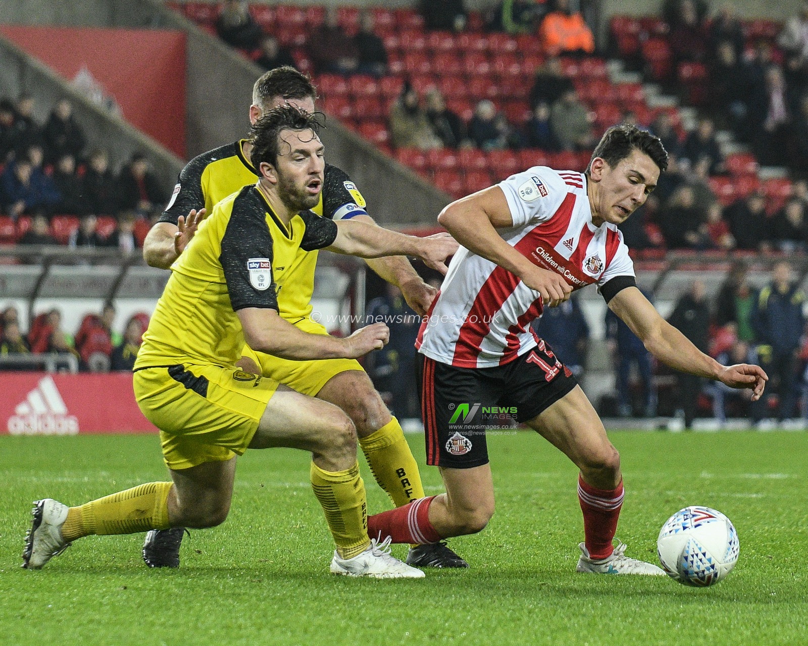 26th November 2019, Stadium Of Light, Sunderland, England; Sky Bet League 1, Sunderland v Burton Albion : Luke O'Nien (13) of Sunderland is brought down by John Brayford (2) of Burton Albion and wins a penalty for his side

Credit: Iam Burn/News Images