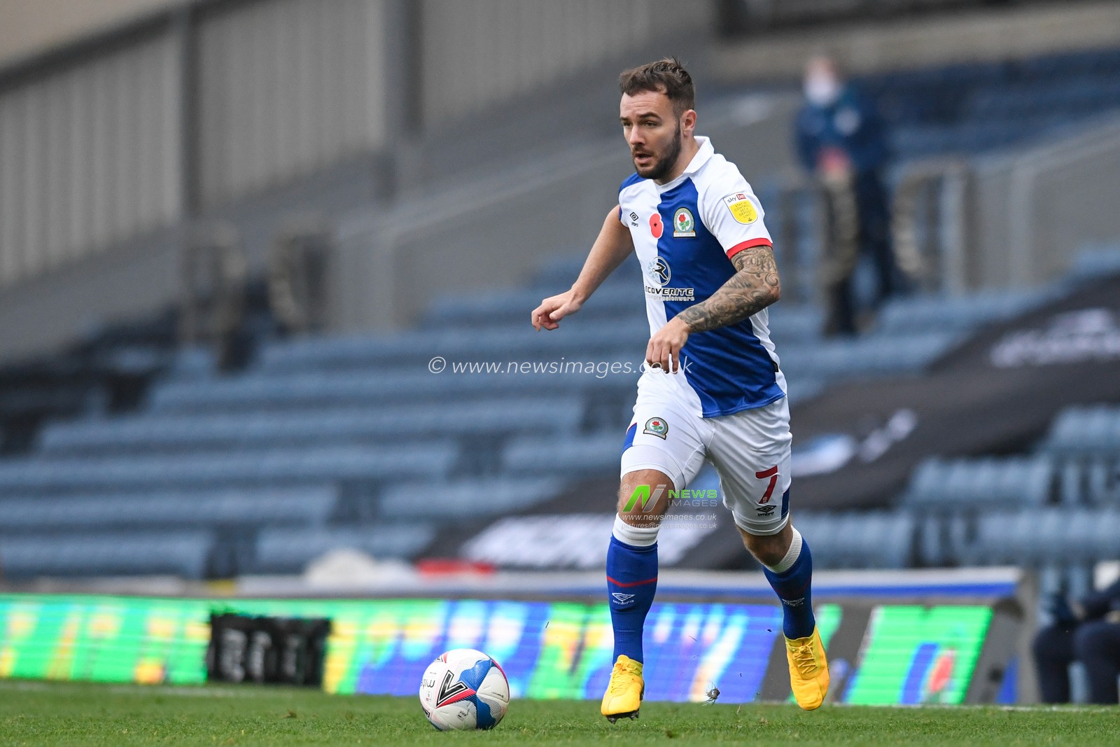 Adam Armstrong #7 of Blackburn Rovers runs forward with the ball