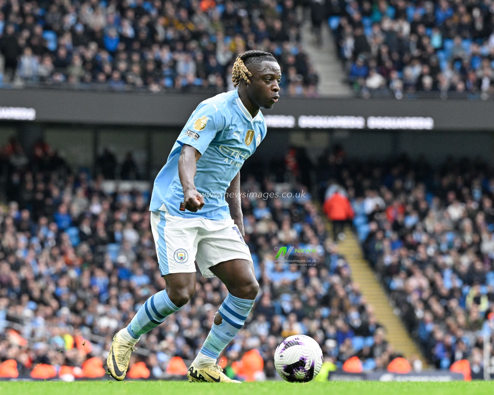 JÃ©rÃ©my Doku of Manchester City in action, during the Premier League match Manchester City vs Luton Town at Etihad Stadium, Manchester, United Kingdom, 13th April 2024

(Photo by Cody Froggatt/News Images)
