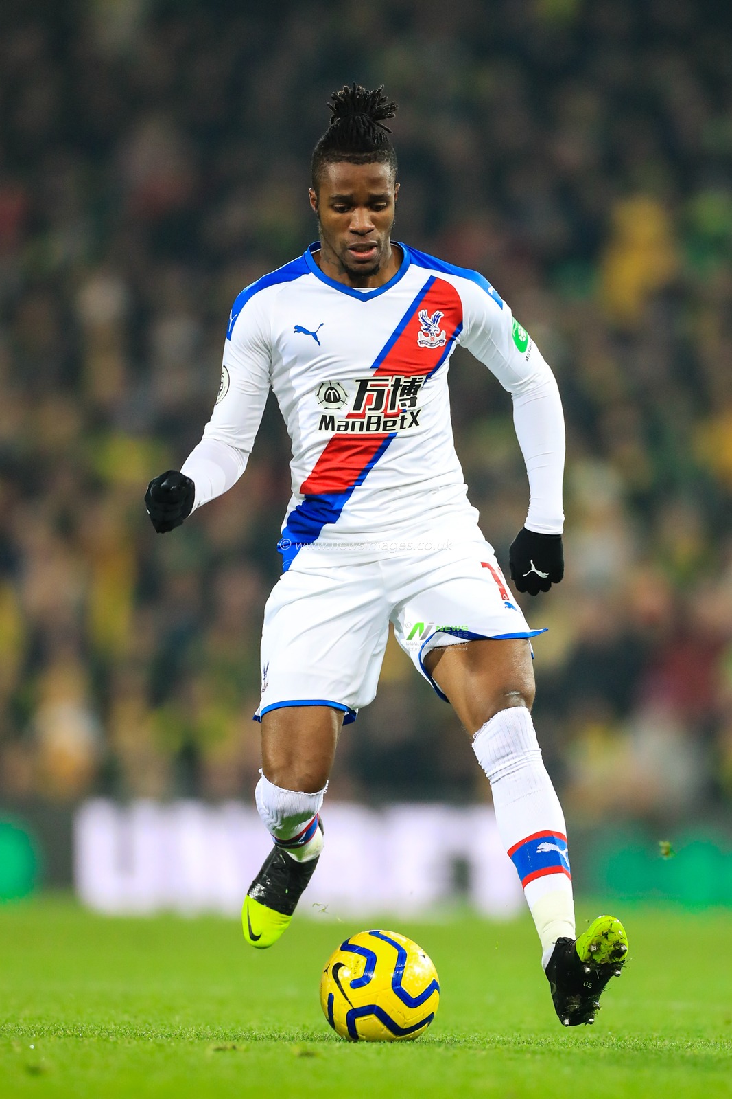 1st January 2020, Carrow Road, Norwich, England; Premier League, Norwich City v Crystal Palace : Wilfried Zaha (11) of Crystal Palace controls the ball

Credit: Georgie Kerr/News Images