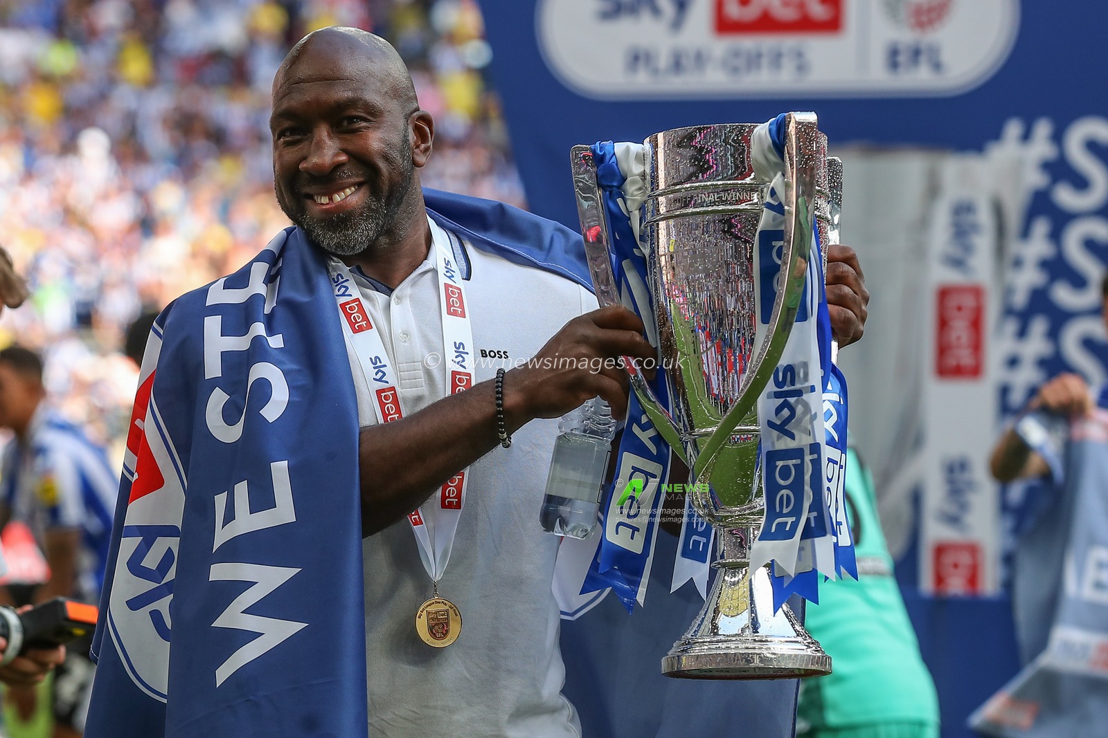 Darren Moore manager of Sheffield Wednesday with the play off trophy after Sky Bet League 1 Play-off Final match Barnsley vs Sheffield Wednesday at Wembley Stadium, London, United Kingdom, 29th May 2023

(Photo by Gareth Evans/News Images)