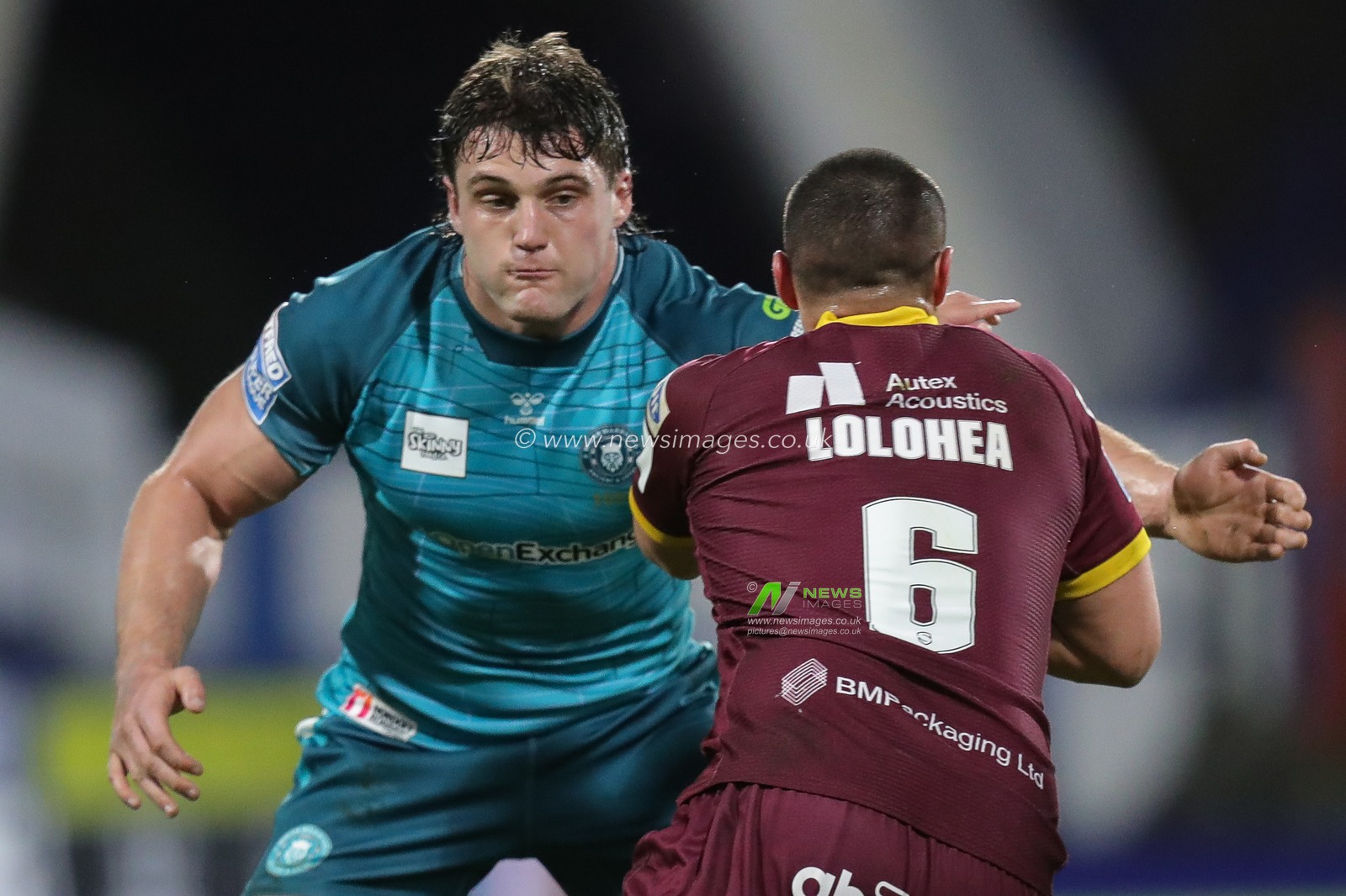 Liam Byrne #10 of Wigan Warriors tackles Tui Lolohea #6 of Huddersfield Giants during the Betfred Super League Round 5 match Huddersfield Giants vs Wigan Warriors at John Smith's Stadium, Huddersfield, United Kingdom, 17th March 2023

(Photo by James Heaton/News Images)