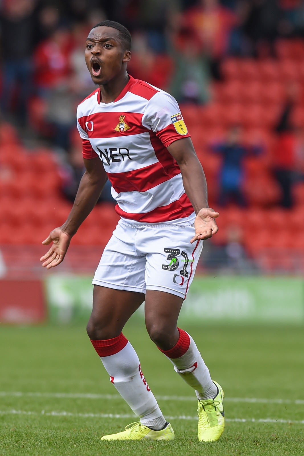 7th September 2019, Keepmoat Stadium, Doncaster, England; Sky Bet League One Football, Doncaster Rovers vs Rotherham United ; Niall Ennis (31) of Doncaster Rovers of celebrates winnning a penalty.
Credit: Dean Williams/News Images

English Football League images are subject to DataCo Licence