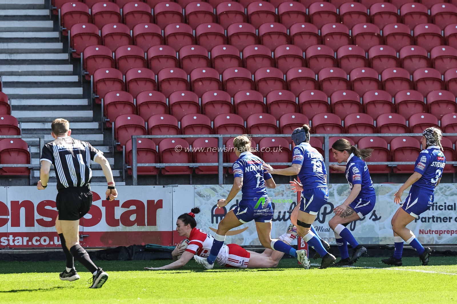 Leah Burke of St Helen’s goes over for a try during the Betfred Women's Challenge Cup Quarter Final match St Helens vs Barrow Raiders at The BrewDog Stadium, St Helens, United Kingdom on 25 April 2026

(Photo by Mark Cosgrove/News Images)