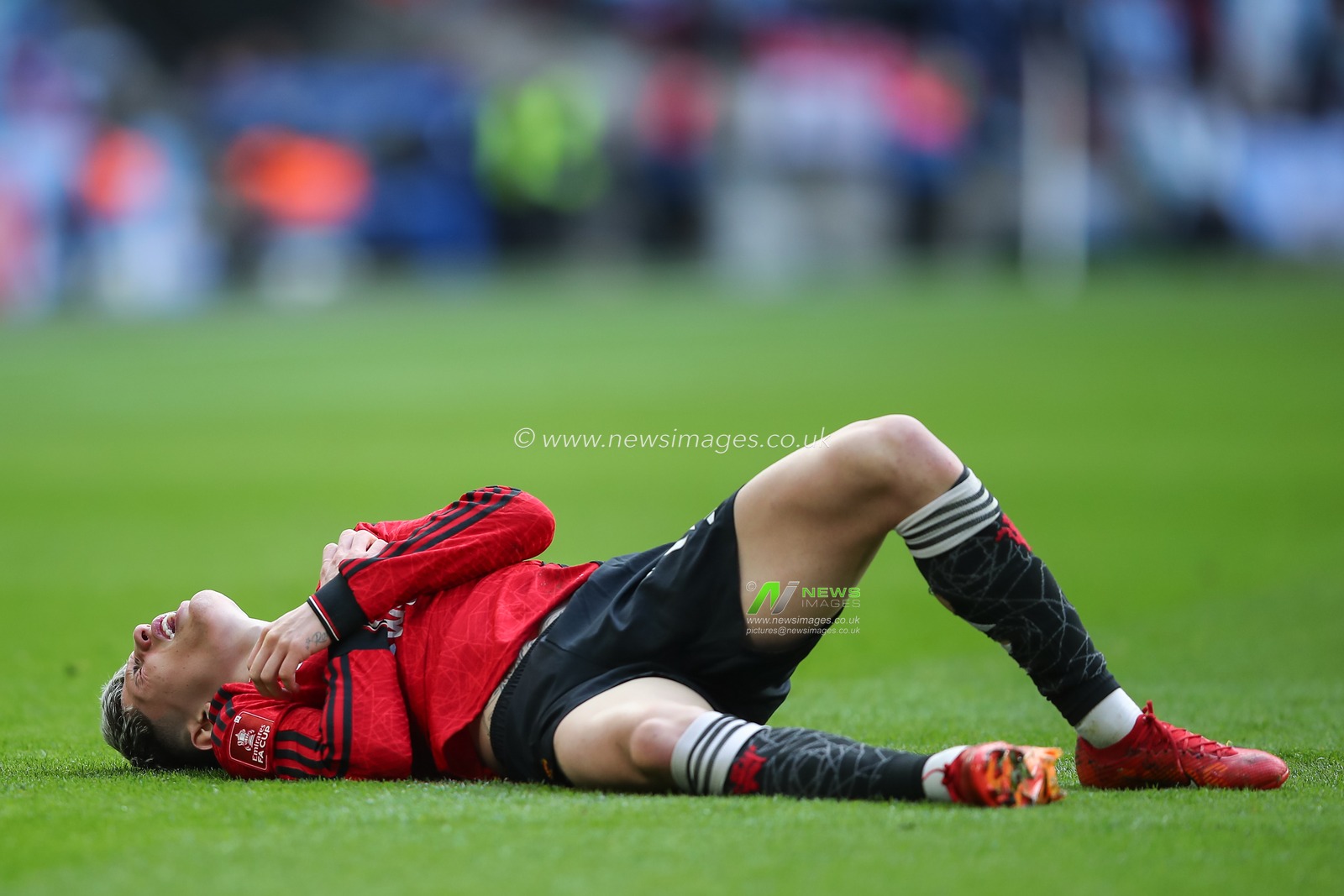 Alejandro Garnacho of Manchester United goes down with a injury, during the Emirates FA Cup Semi-Final match Coventry City vs Manchester United at Wembley Stadium, London, United Kingdom, 21st April 2024

(Photo by Gareth Evans/News Images)