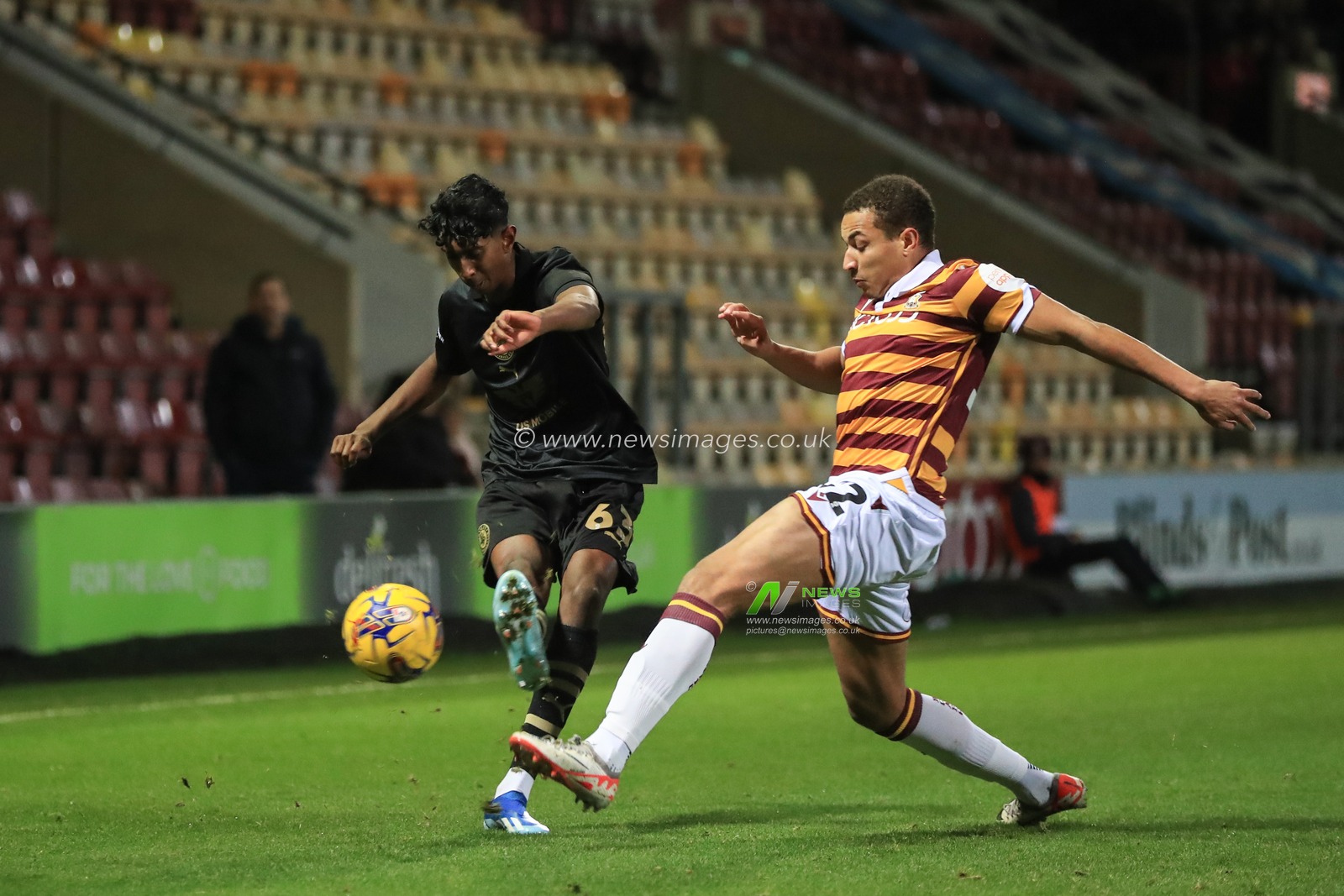 Vimal Yoganathan #63 of Barnsley crosses the ball during the Bristol Street Motors Trophy match Bradford City vs Barnsley at University of Bradford Stadium, Bradford, United Kingdom, 21st November 2023

(Photo by Alfie Cosgrove/News Images)