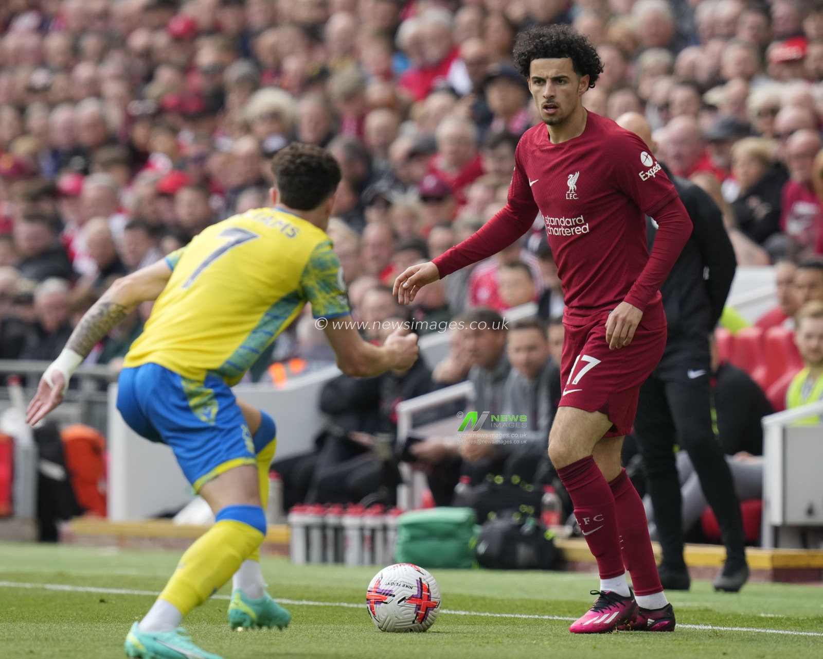 Curtis Jones #17 of Liverpool takes on Neco Williams #7 of Nottingham Forest during the Premier League match Liverpool vs Nottingham Forest at Anfield, Liverpool, United Kingdom, 22nd April 2023

(Photo by Steve Flynn/News Images)