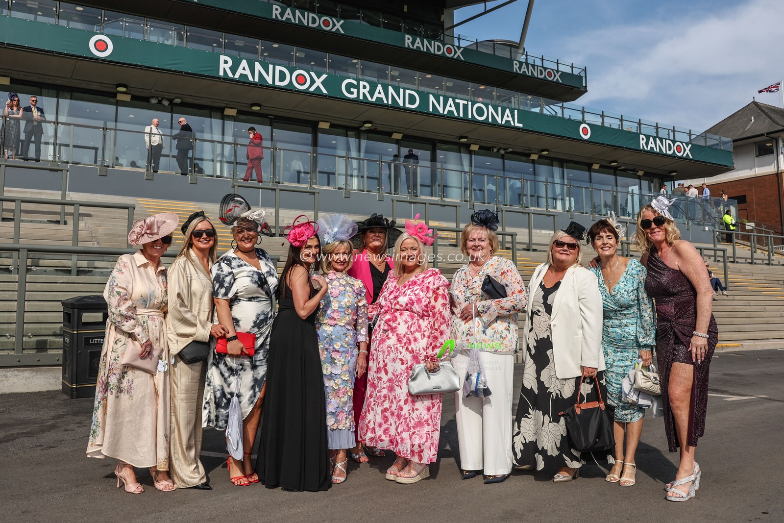 Ladies arrive during the Randox Grand National 2025 Day 2 Ladies Day at Aintree Racecourse, Liverpool, United Kingdom, 4th April 2025

(Photo by Mark Cosgrove/News Images)