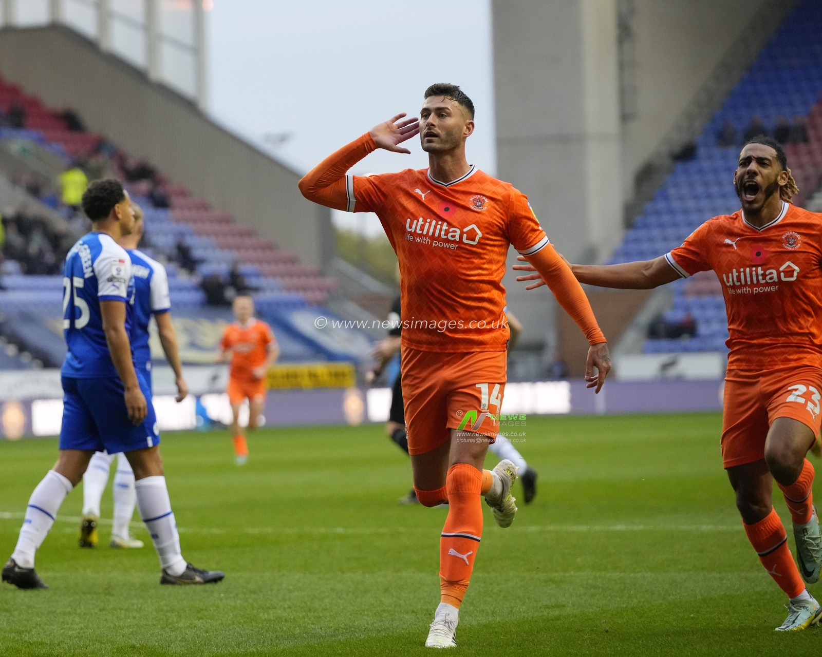 Gary Madine #14 of Blackpool celebrates scoring a goal to make it 1-0 during the Sky Bet Championship match Wigan Athletic vs Blackpool at DW Stadium, Wigan, United Kingdom, 12th November 2022

(Photo by Steve Flynn/News Images)