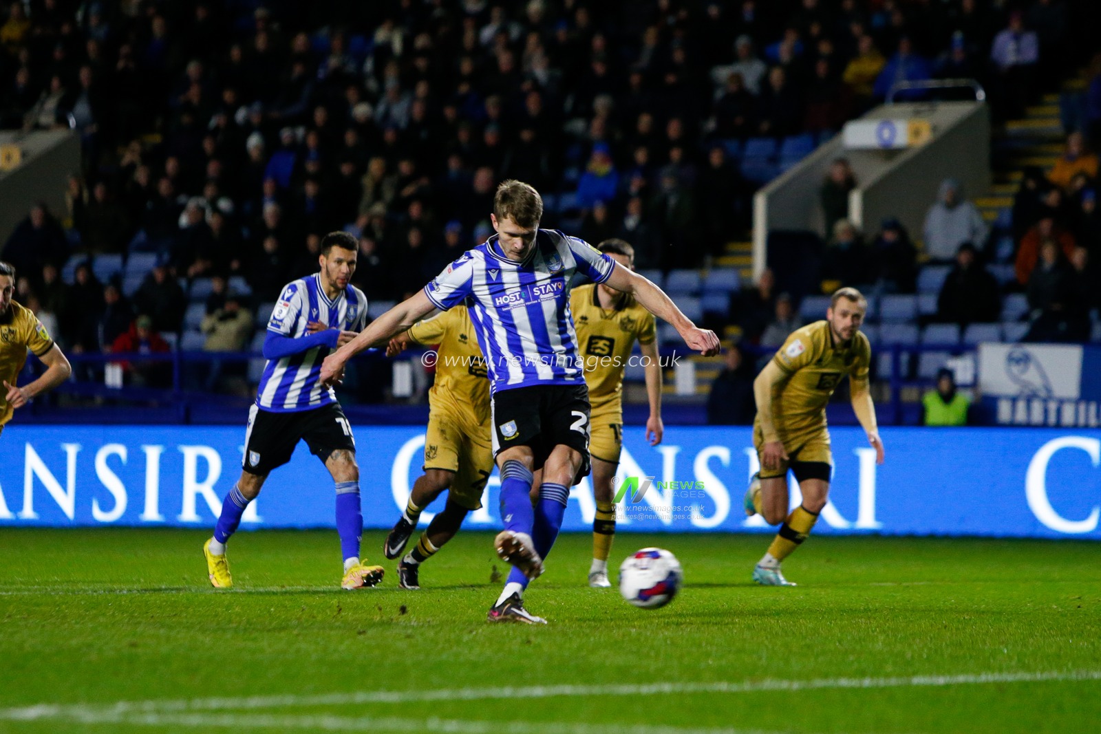 Michael Smith #24 of Sheffield Wednesday scores a penalty to make it 1-0 during the Sky Bet League 1 match Sheffield Wednesday vs Port Vale at Hillsborough, Sheffield, United Kingdom, 29th December 2022

(Photo by Ben Early/News Images)