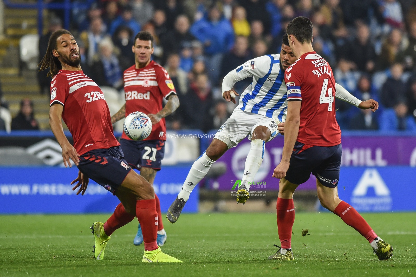 23rd October 2019, John Smith's Stadium, Huddersfield, England; Sky Bet Championship, Huddersfield Town v Middlesbrough :Elias Kachunga (9) of Huddersfield Town takes a rare second half shot.

Credit: Dean Williams/News Images