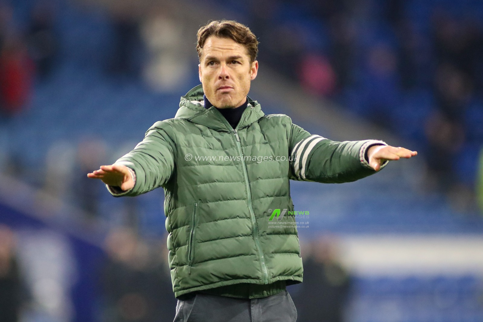 Burnley Head Coach Scott Parker celebrates with the Burnley fans at the final whistle during the Sky Bet Championship match Cardiff City vs Burnley at Cardiff City Stadium, Cardiff, United Kingdom, 4th March 2025

(Photo by Andrew Lewis/News Images)