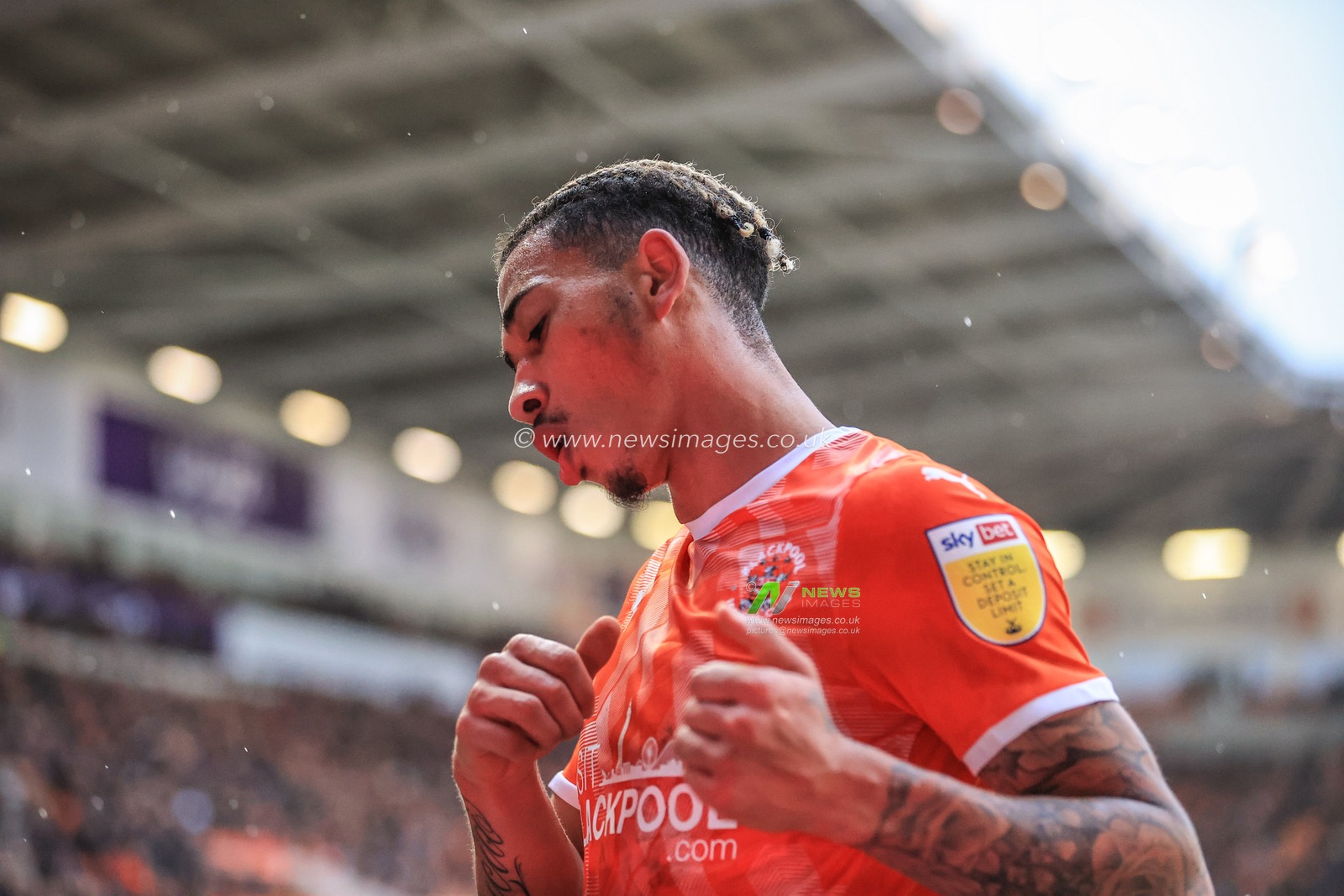 Jordan Lawrence-Gabriel #4 of Blackpool reacts after his shot is tipped over the bar