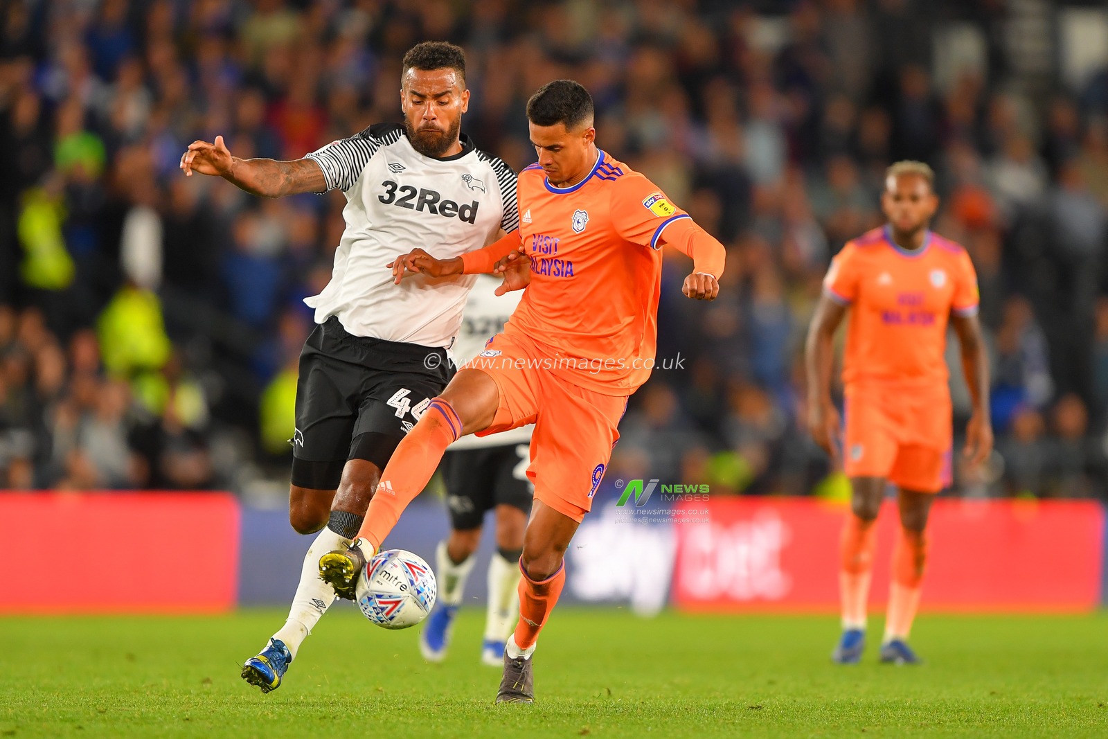 13th September 2019, Pride Park, Derby, England; Sky Bet Championship Football, Derby County vs Cardiff City ; Robert Glatzel (9) of Cardiff City battles with Tom Huddlestone (44) of Derby County 

Credit: Jon Hobley/News Images 

English Football League images are subject to DataCo Licence