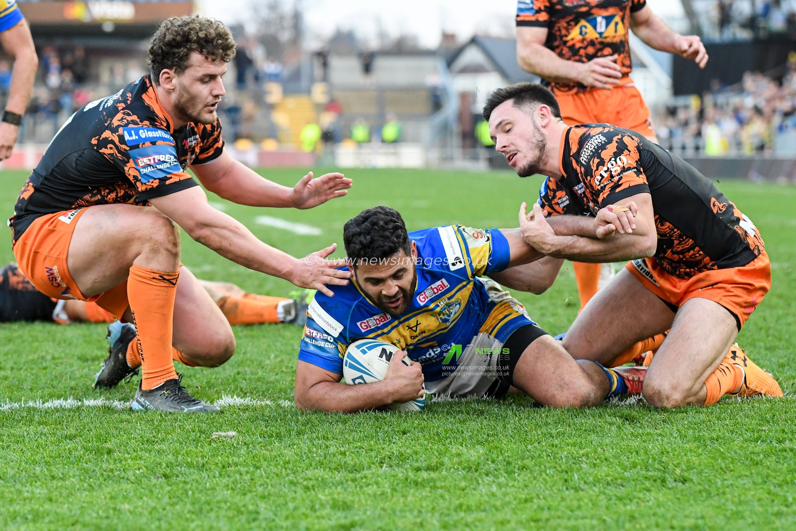 Rhyse Martin #12 of Leeds Rhinos goes over for a try to make it 14-34