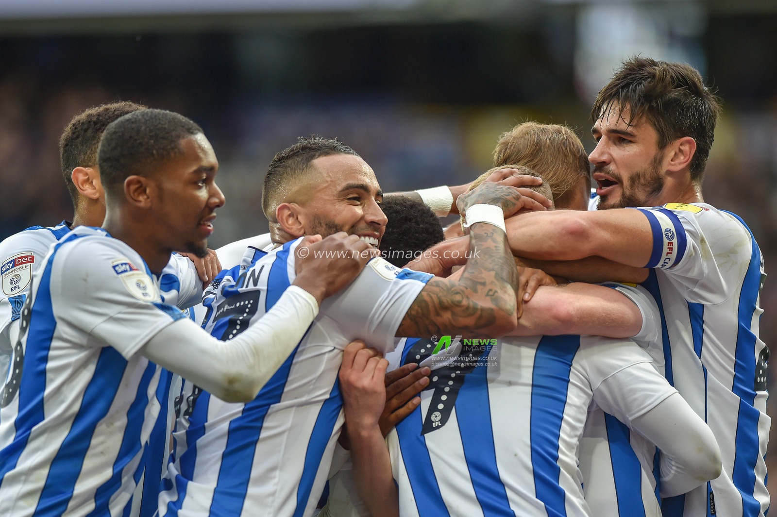 5th October 2019, John Smith's Stadium, Huddersfield, England; Sky Bet Championship, Huddersfield Town v Hull City :Huddersfield Town players celebrate Elias Kachunga (9) of Huddersfield Town goal to make it 3-0.
Credit: Dean Williams/News Images